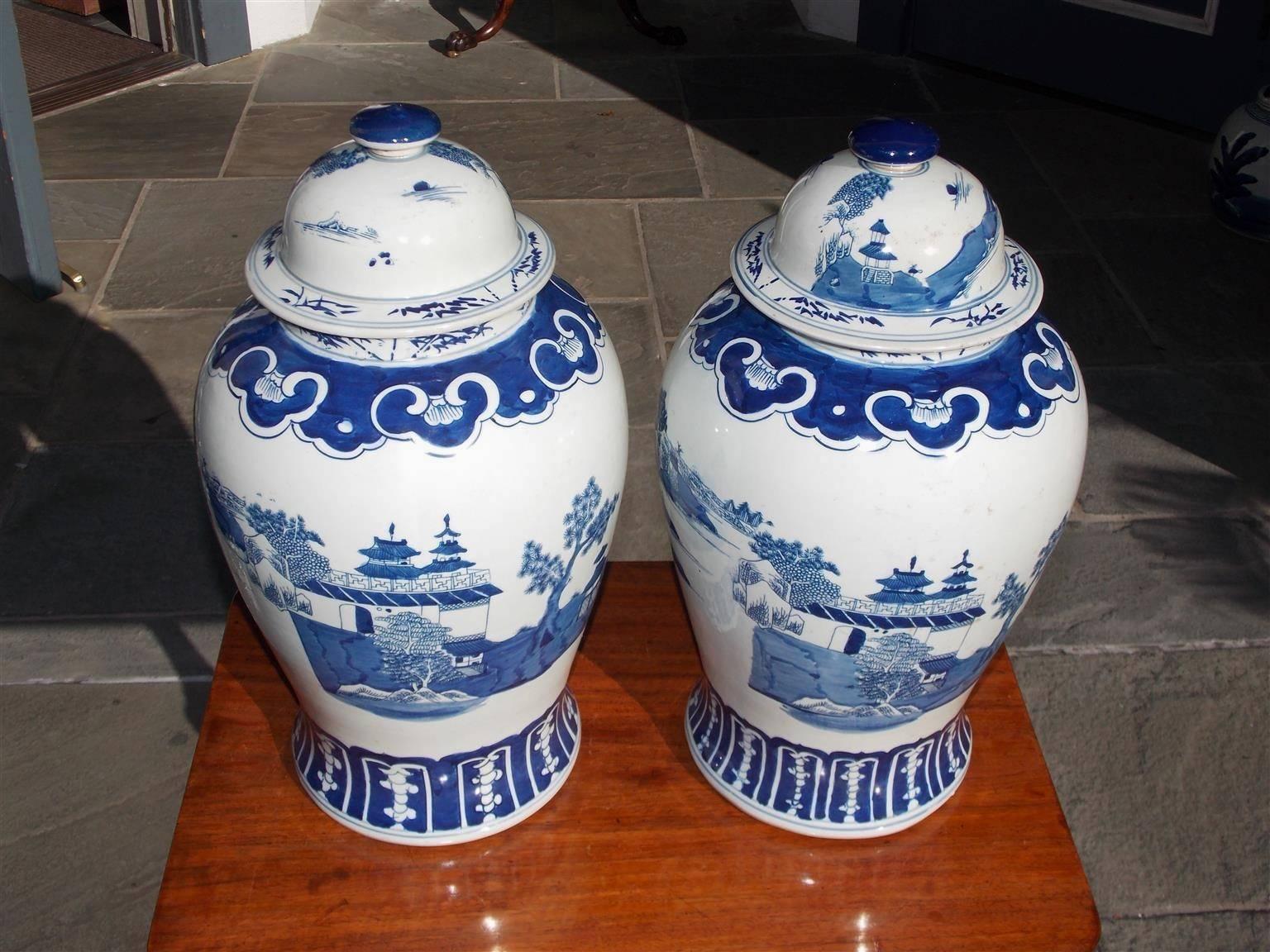 20th Century Pair of Chinese Porcelain Glazed Blue & White Temple Jars with Lids, 20th Cent.