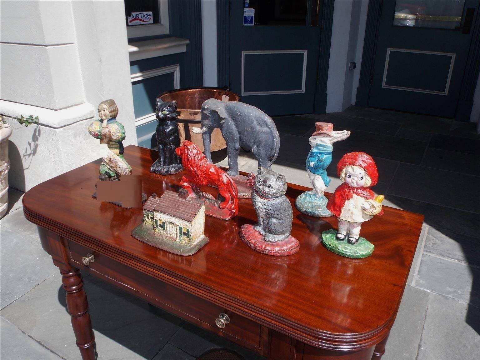 Juego de topes de puerta decorativos de hierro fundido pintados con colores vibrantes, Circa 1900 en Excelente estado para la venta en Charleston, SC