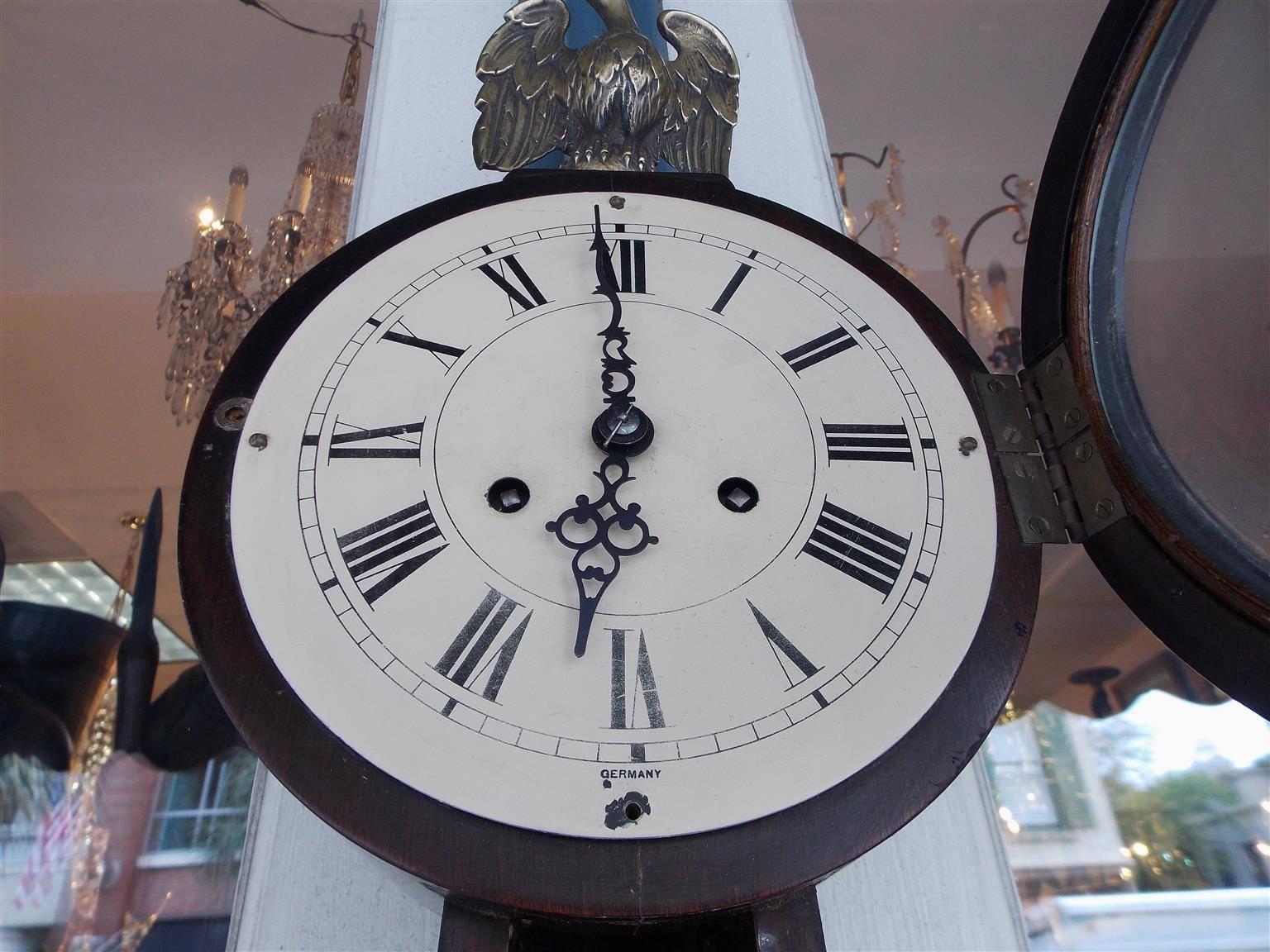 Empire German Mahogany Eglomise Banjo Clock.  Circa 1880