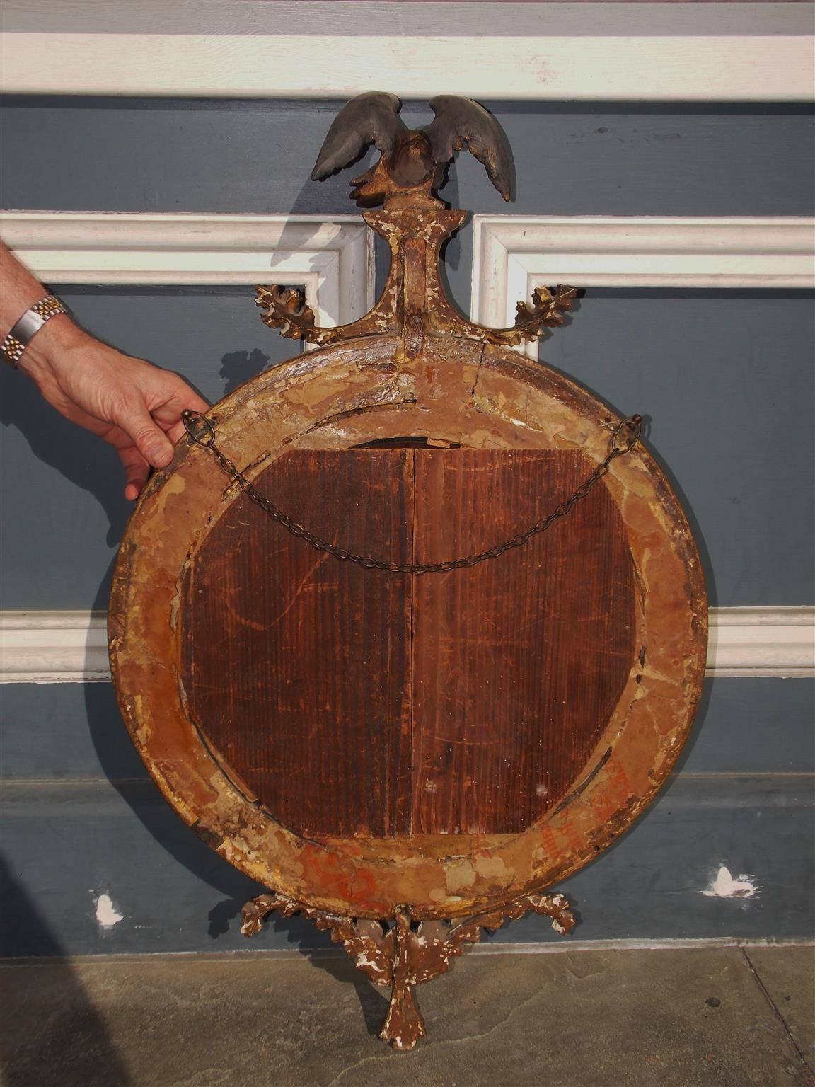 English Gilt Convex Mirror with Ebonized Perched Eagle, Circa 1810 For Sale 1