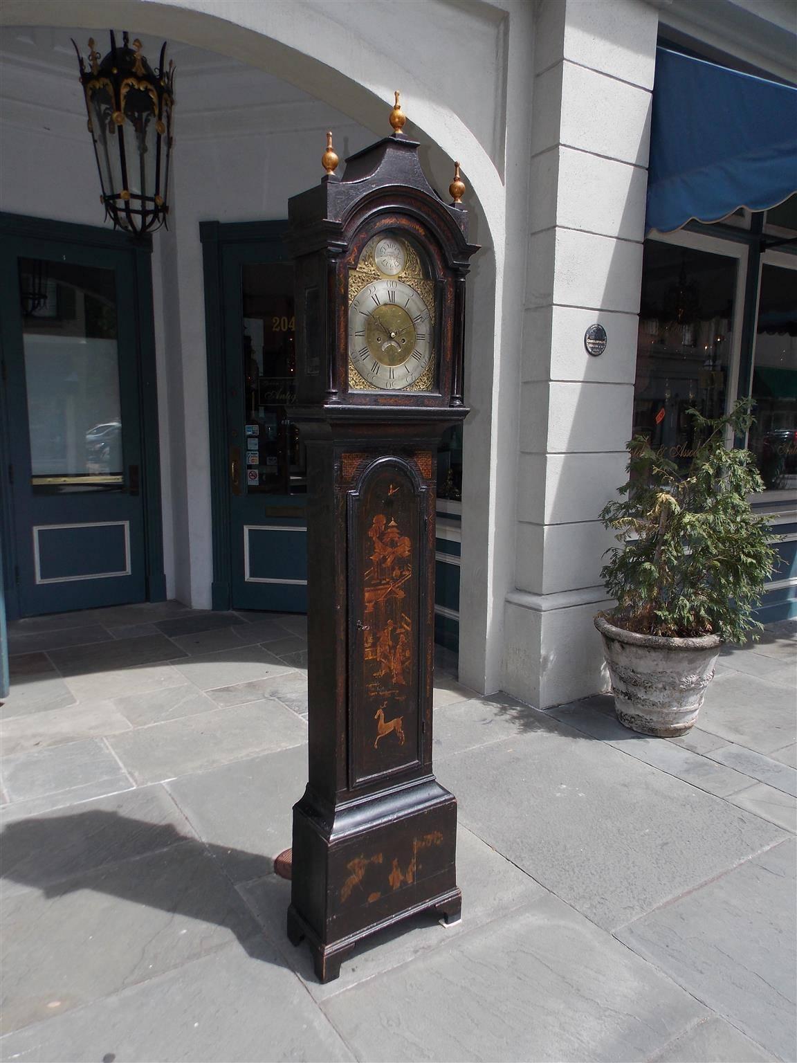 English chinoiserie gilt and black lacquered tall case clock with flanking gilt bulbous finials, arched dome with a steel numeral engraved face surrounded by urn floral ormolu, pagoda and figural gilt trunk revealing the original brass weights and