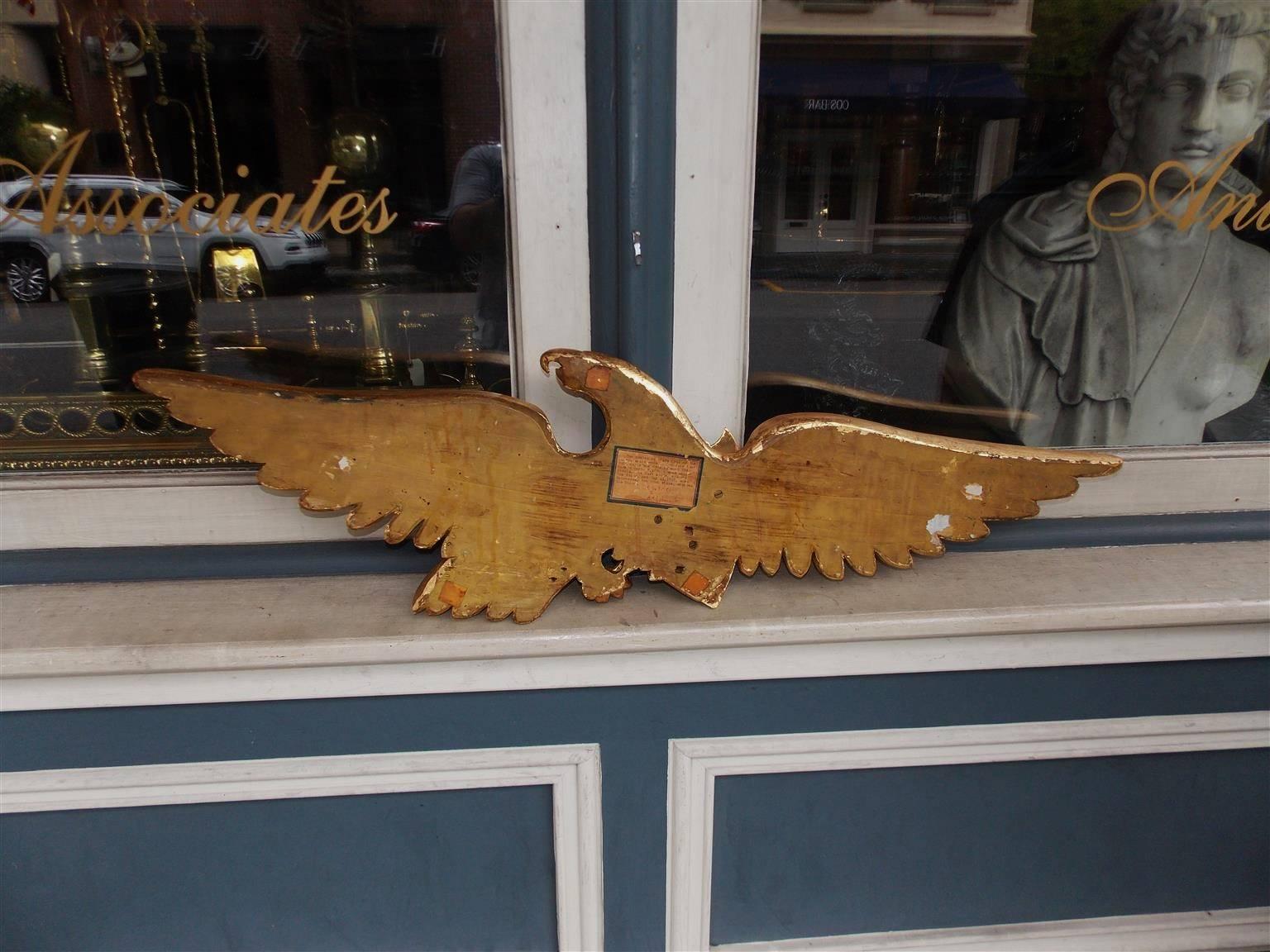 Giltwood American Gilt Spread Wing Eagle Grasping Patriotic Painted Shield, Circa 1850