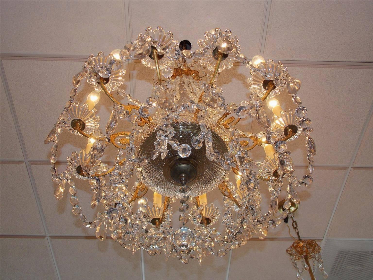 French Baccarat Gilt Bronze and Crystal Twelve-Arm Chandelier, Circa 1820 For Sale 1