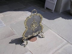 French Brass Cherub and Decorative Foliage Fire Place Screen, Circa 1830