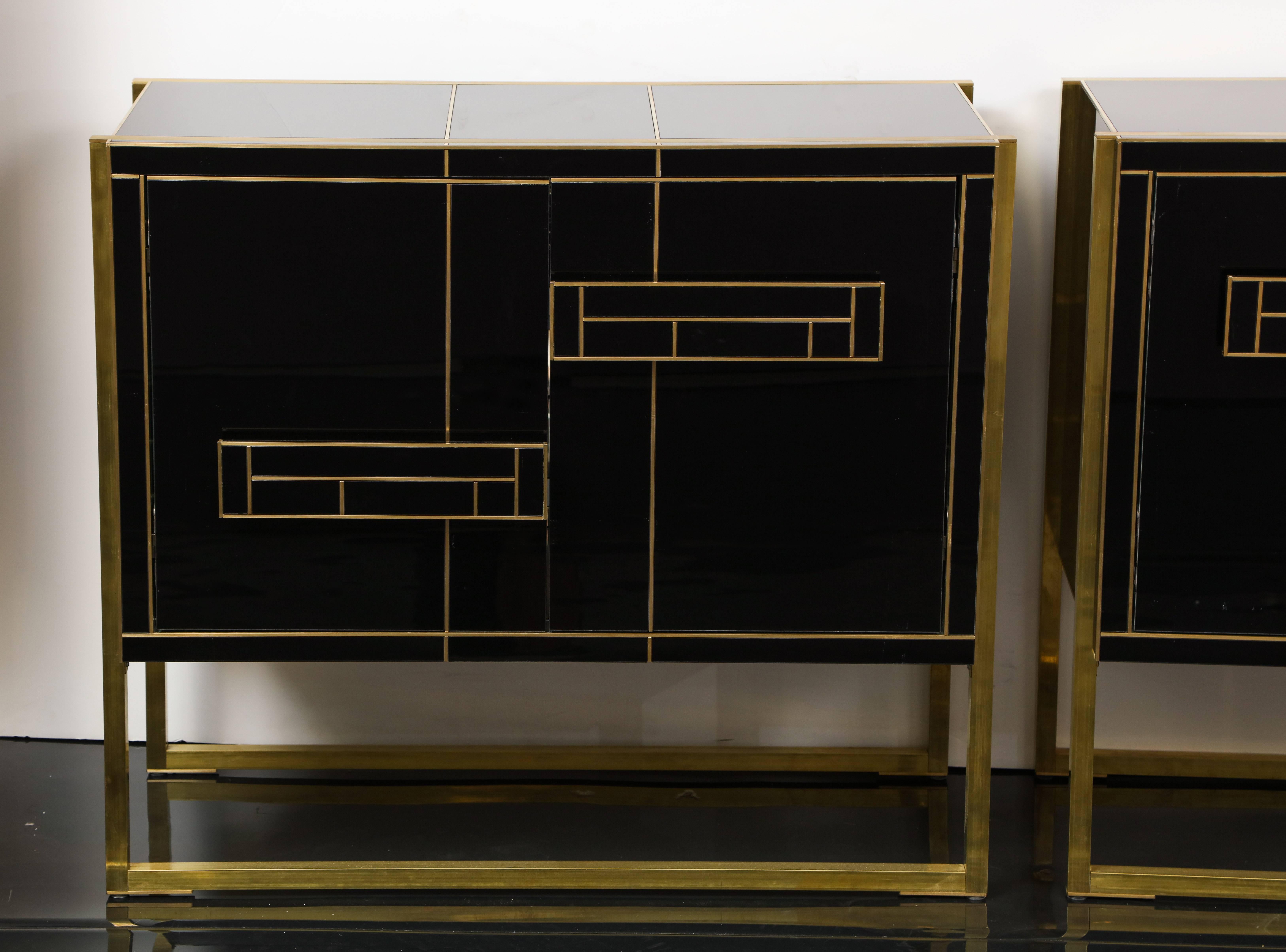 Mid-Century Modern One of a Kind Signed Pair of Black Glass and Brass Cabinets