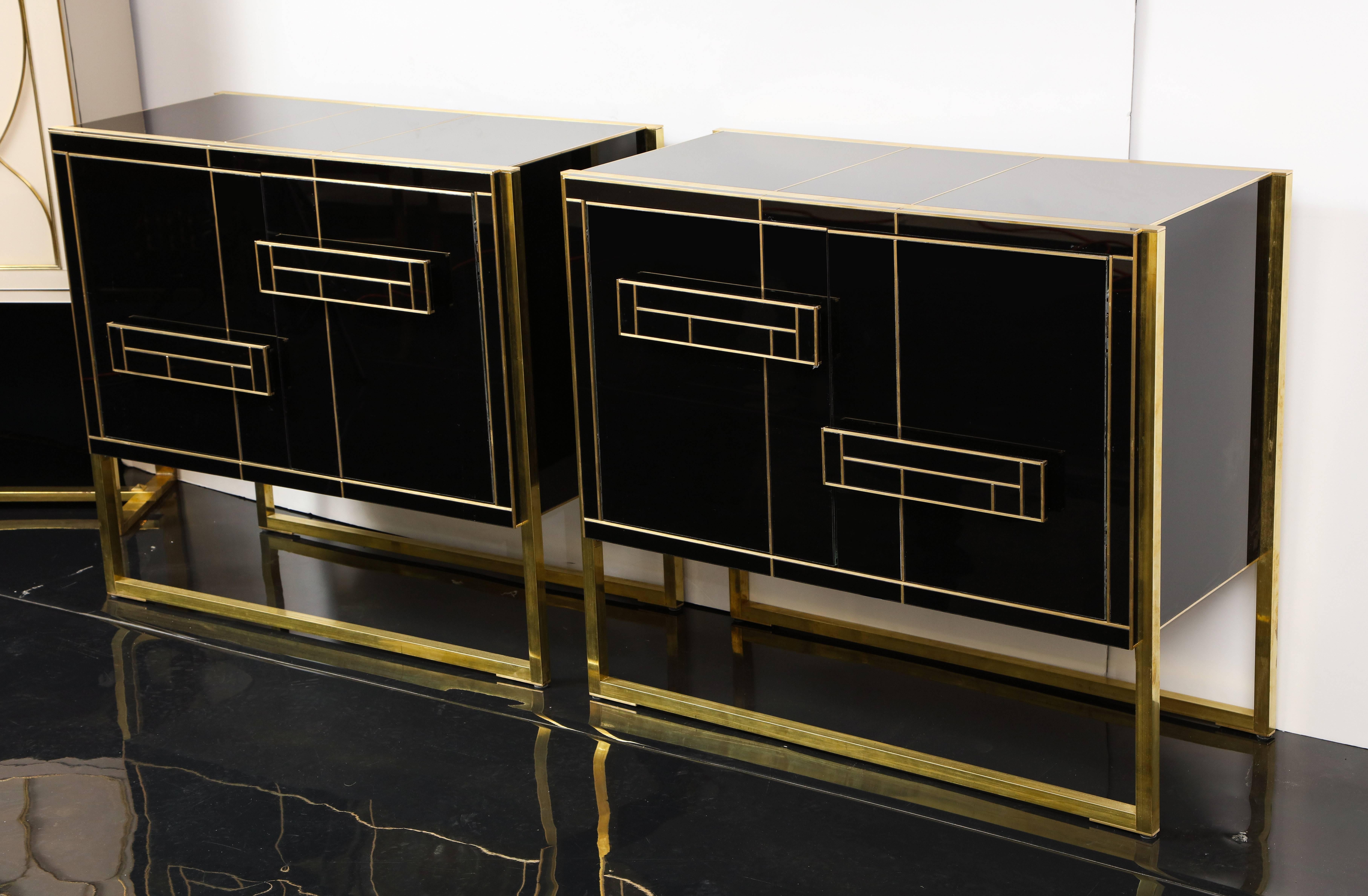 Contemporary One of a Kind Signed Pair of Black Glass and Brass Cabinets
