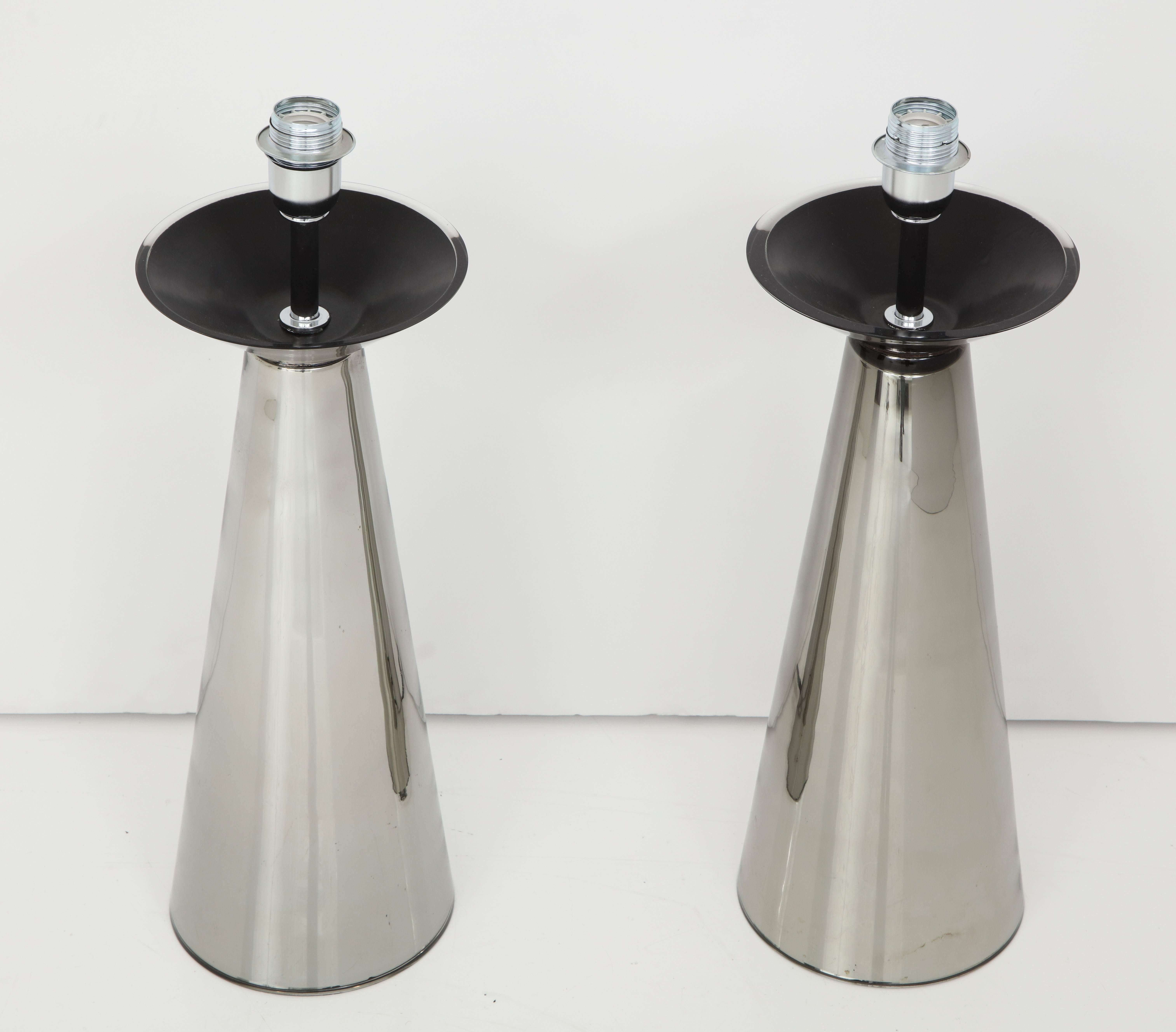 Pair of Italian hand blown silver colored Murano mercury glass lamps consist of a conical glass base with a silver glass neck with black contrasting. Absolutely a unique piece of Italian art signed by the glass master himself, Alberto Dona.