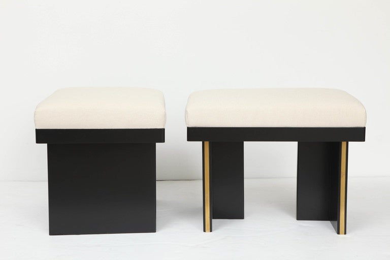 These stools are black lacquered with a gold trim.
They have been newly reupholstered with a neutral wool cotton fabric.