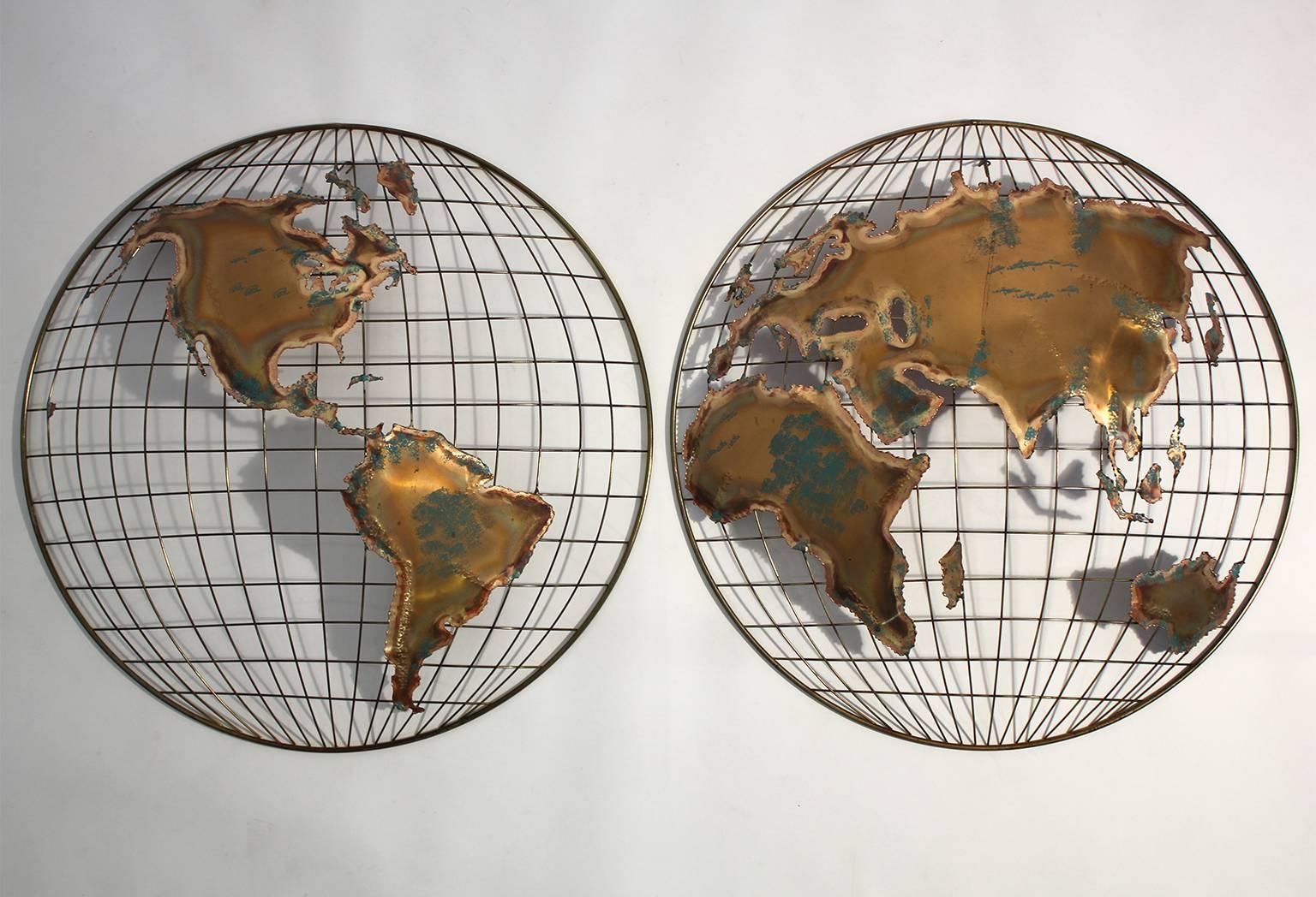 Wall mounted continents/world map/globe/hemispheres sculpture from C. Jere in excellent vintage condition. Each hemisphere measures 27.5