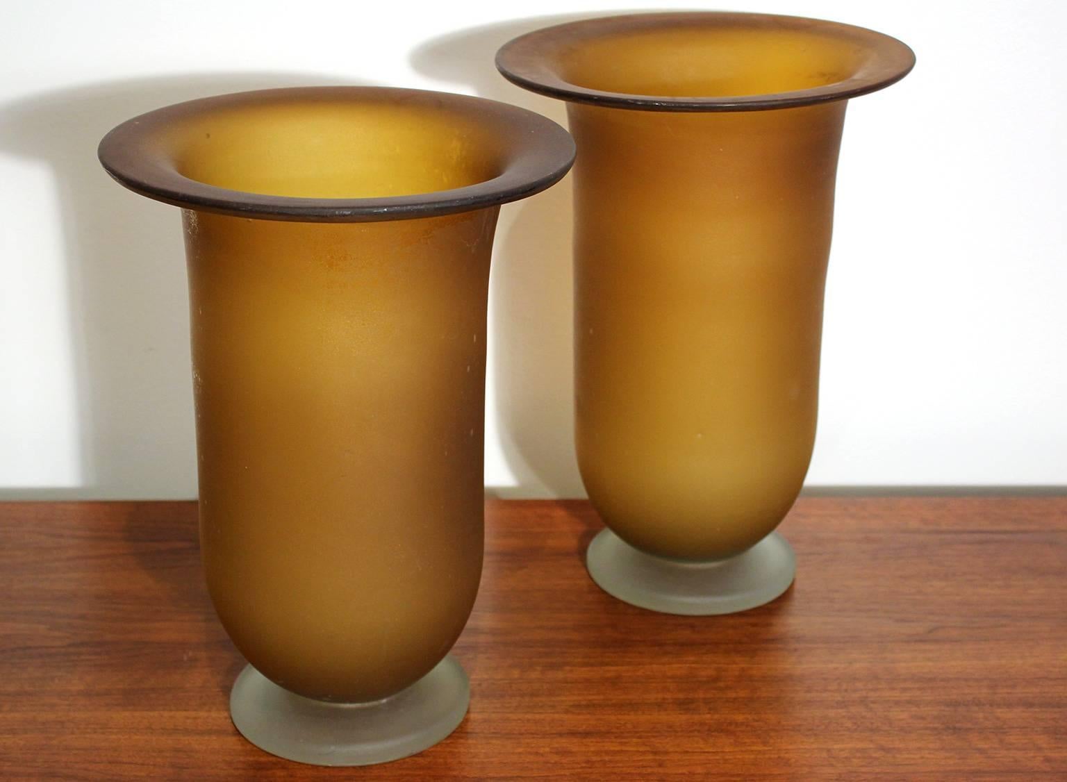 Large pair of Murano glass vases with wide flaring rim. Circa 1970s. Small imperfection on top edge as pictured. Appears to be a manufacturing flaw from when the glass was made and original to the vase. In excellent vintage condition. One vase is