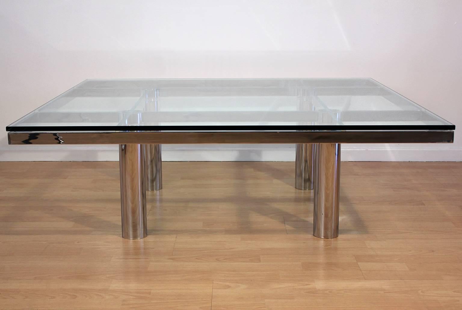 Glass top coffee or cocktail table with heavy chrome steel base designed by Tobia Scarpa for Knoll. All original vintage condition.
