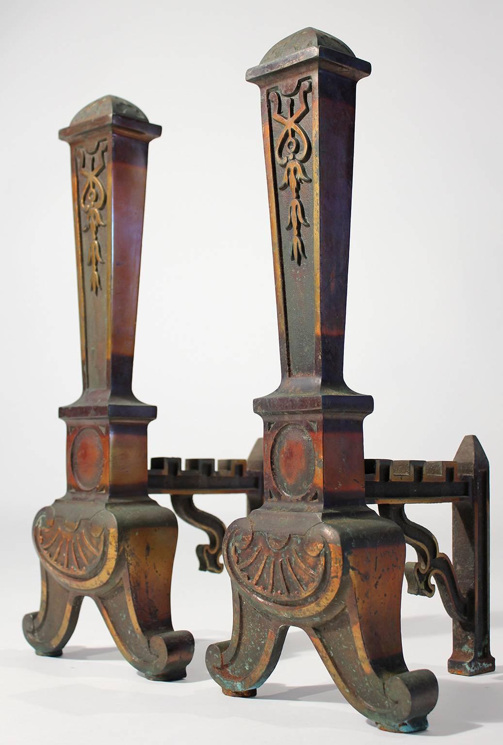 Pair of antique Arts & Crafts decorative brass andirons with beautiful patina.