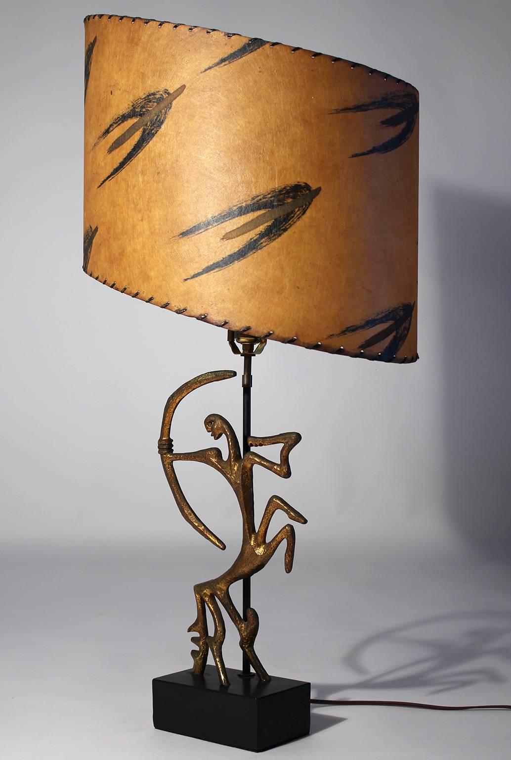 Rare vintage Frederick Weinberg lamp with unusual original shade and bronze Sagittarius sculptural figure.

Overall: 18