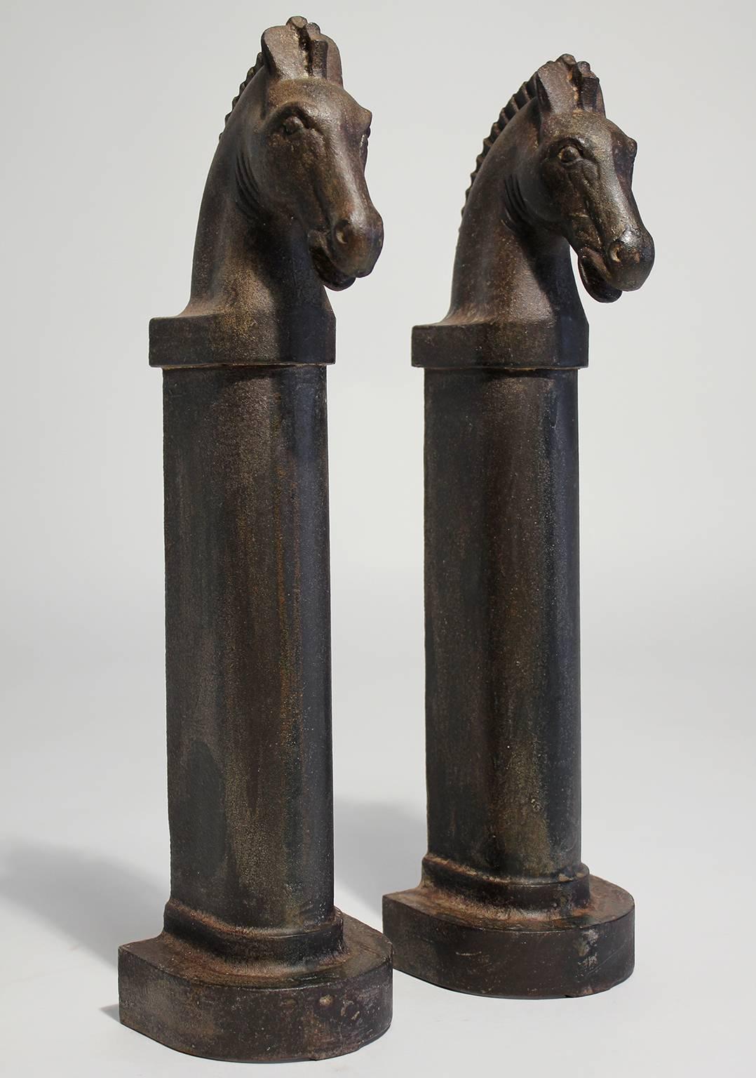 Fantastic pair of antique Art Deco cast iron decorative and sculptural horse head andirons with nice aged natural patina.