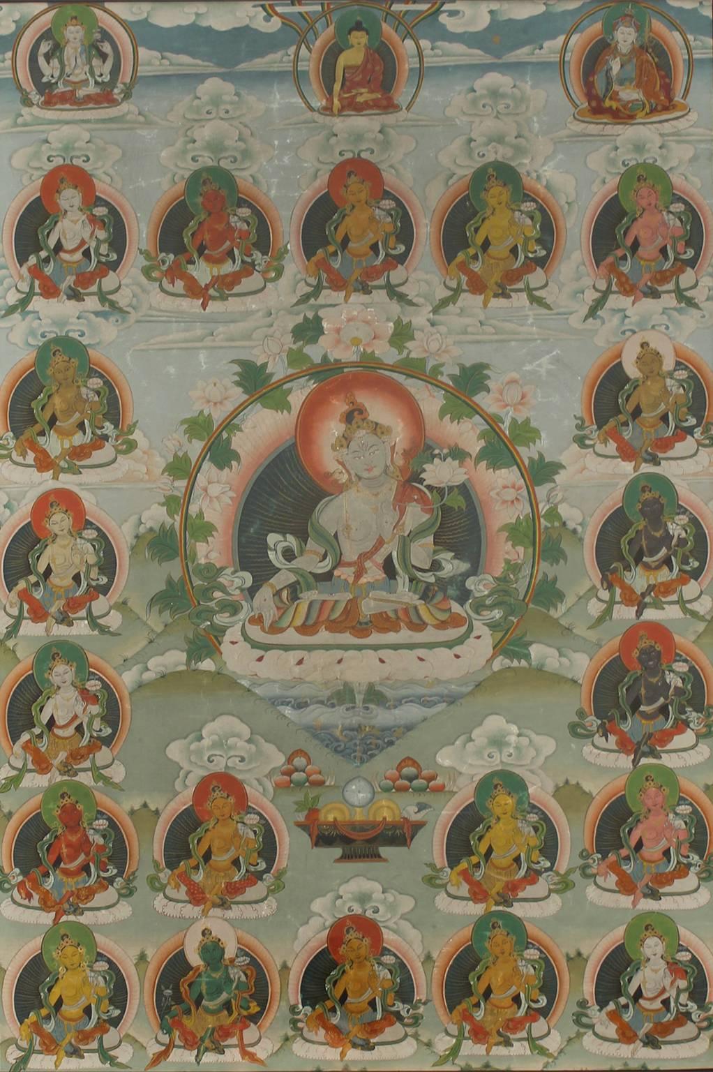 Beautiful antique Thangka painting with seated Tara. In great condition for its age and has been professionally framed. Measures: Frame 29