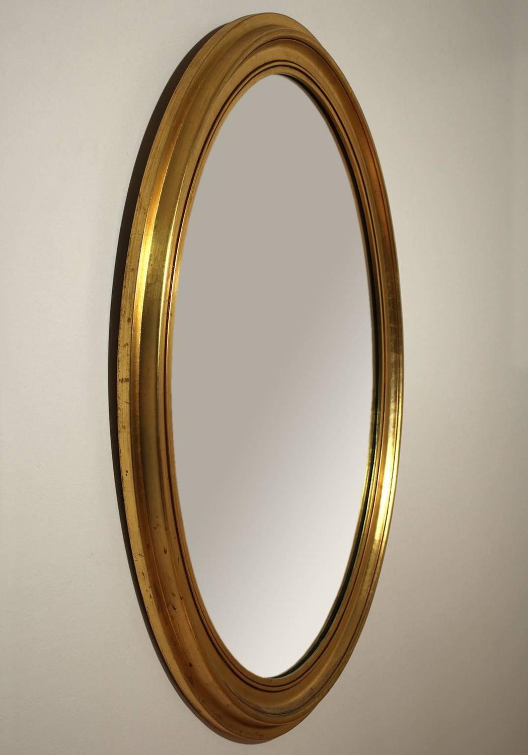 Gold Gilt Wooden Oval Wall Mirror For Sale at 1stdibs