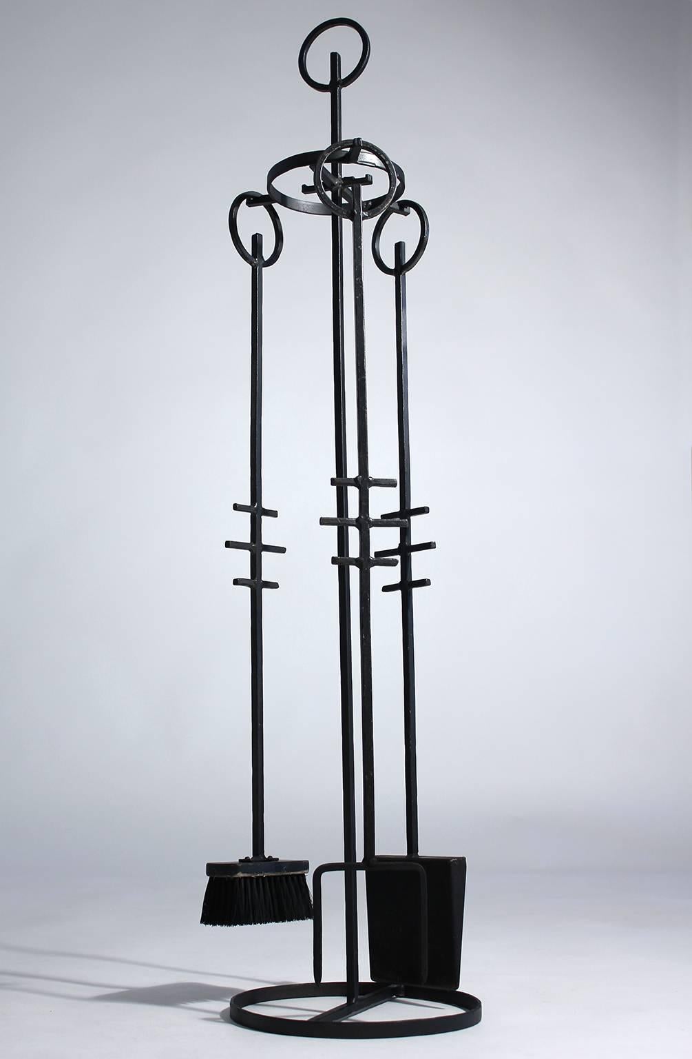 Rare set of original wrought iron fire tools attributed to Erik Hogland. Great modernist design and form, circa 1960s. Excellent original vintage condition.