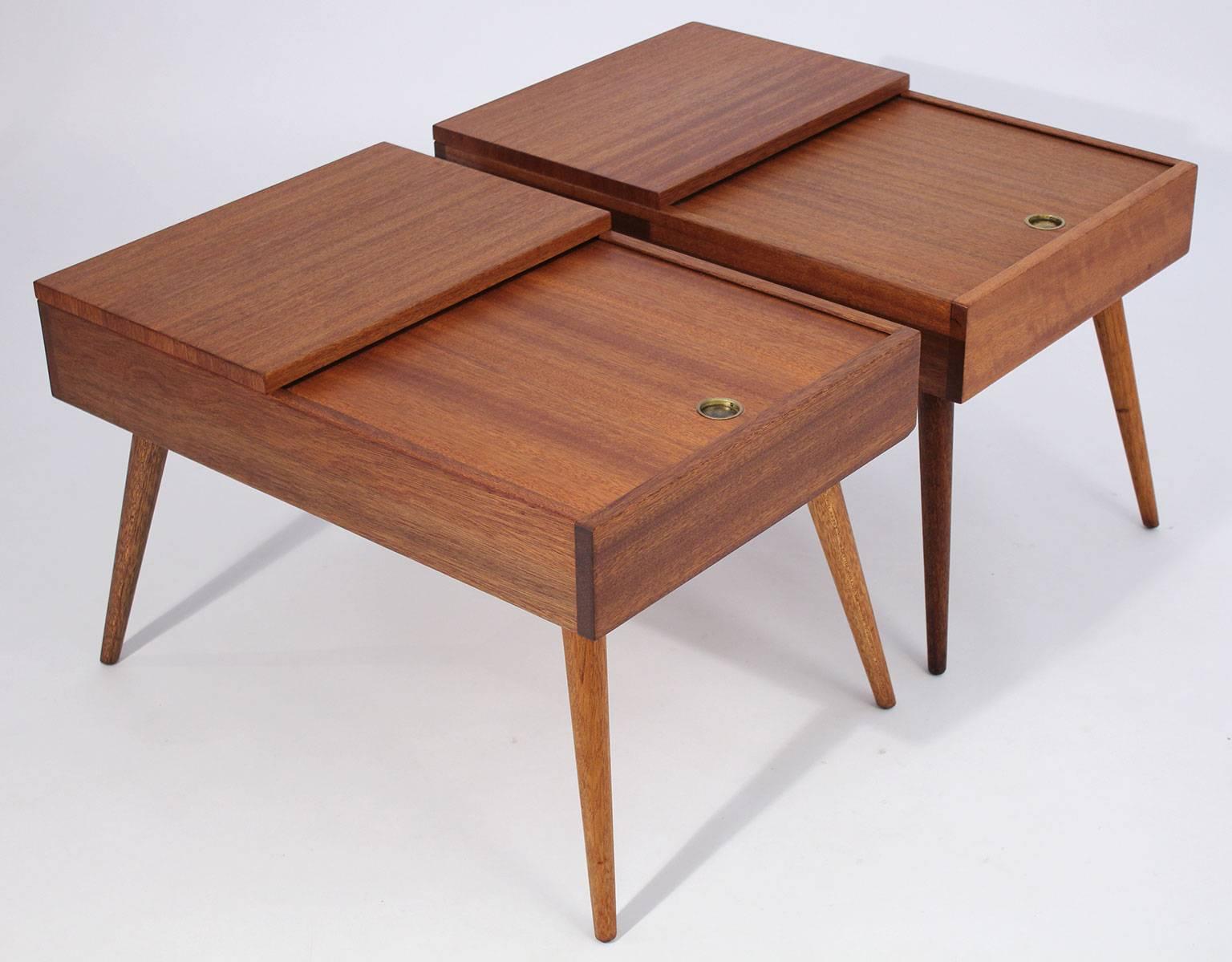 Early Brown Saltman end tables designed by John Keal, circa 1950s. Made of beautiful mahogany wood. Top drawer slides for storage. Wood is completely restored to original condition.