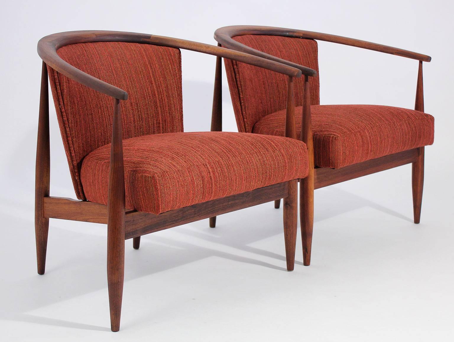 Sculptural kodawood walnut sitting long chairs. Completely restored wood frames with new upholstery. They retain the original tags on the underside of the chairs. These chairs have a great design and form. Very comfortable and a statement piece in