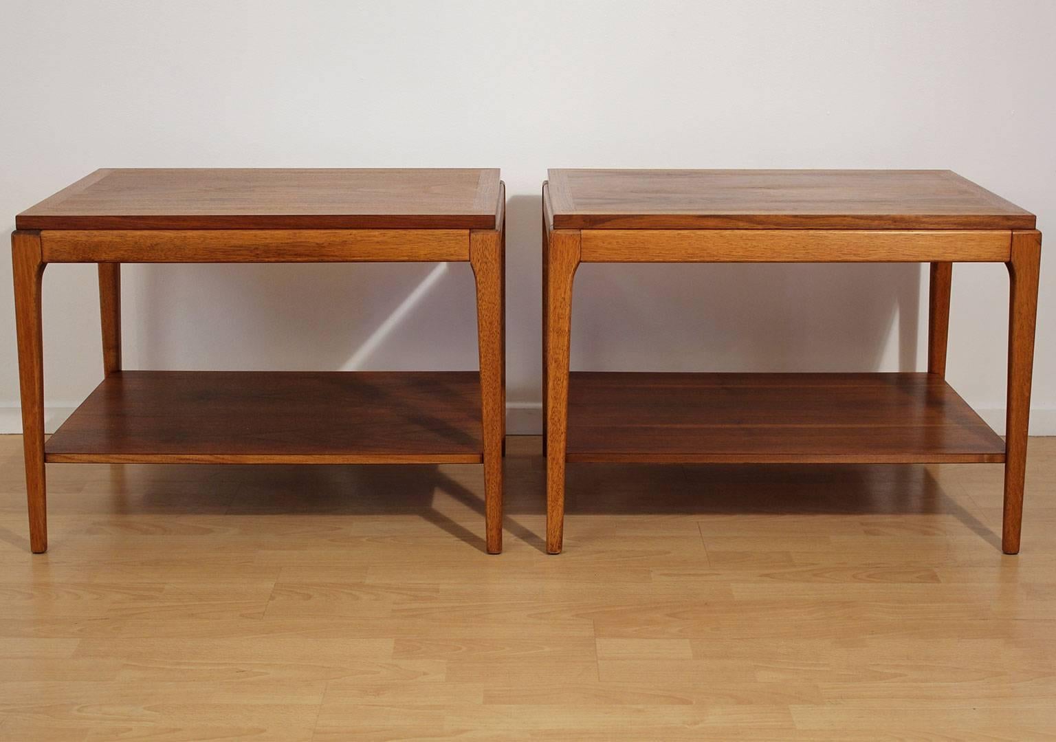 Pair of sculptural modernist Lane end tables, circa 1950s. Made of walnut wood and have been beautifully refinished. Hand oiled to bring out the beauty of the natural wood. Simple modernist design for any setting.