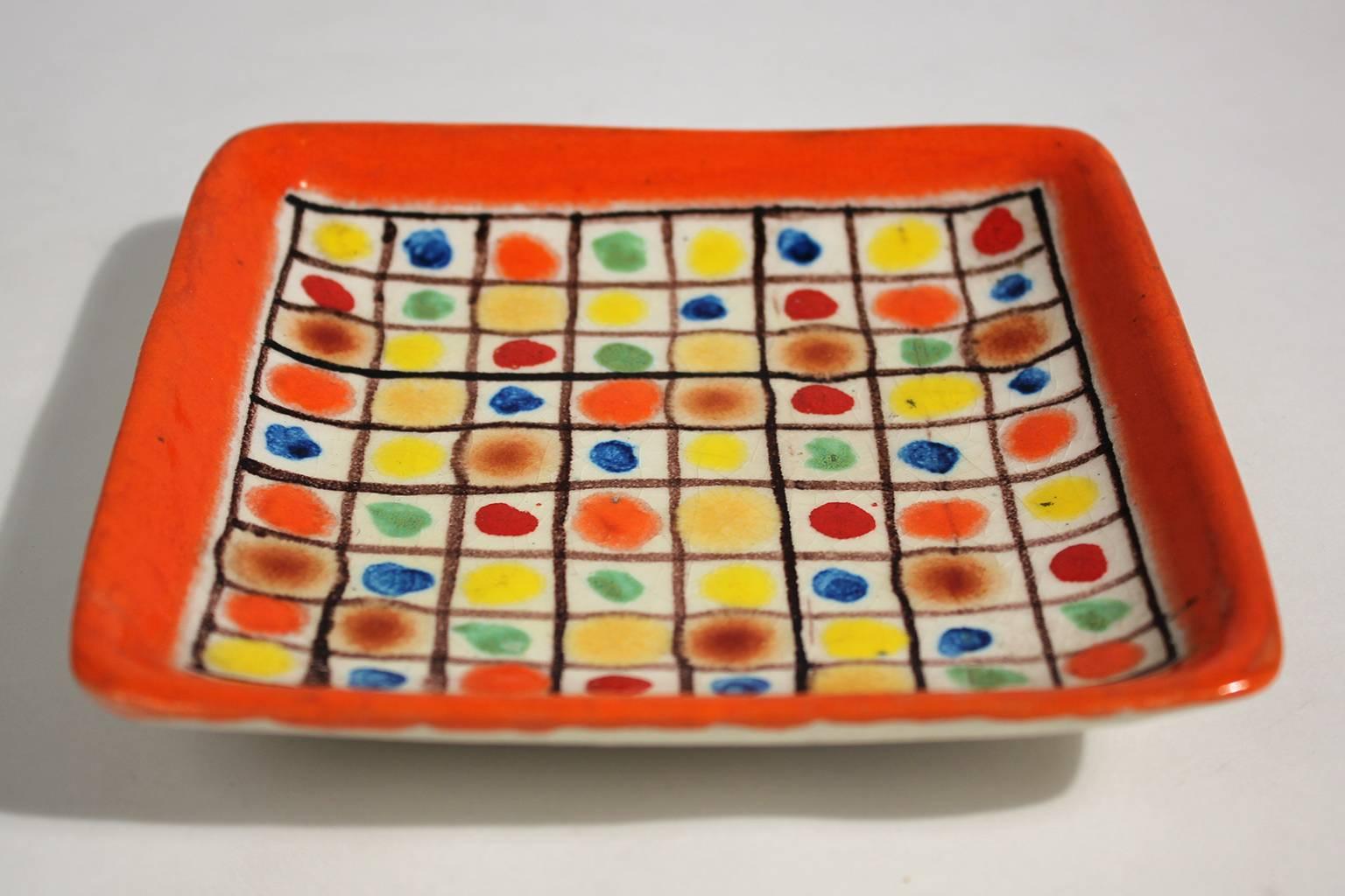 Stunning modernist Italian ceramic polychrome tray or plate by Guido Gambone. Rarely seen color dot design. In excellent shape and is signed on back.
