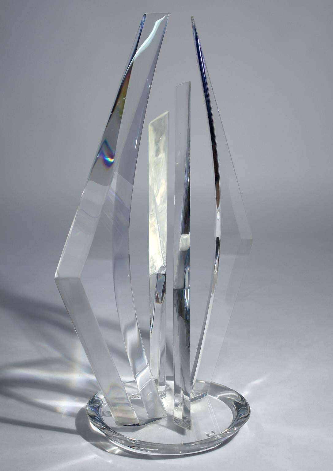 Large abstract Lucite sculpture by Hivo Van Teal. Signed on the base. Minor edge chip located on the inside of one of the pieces.