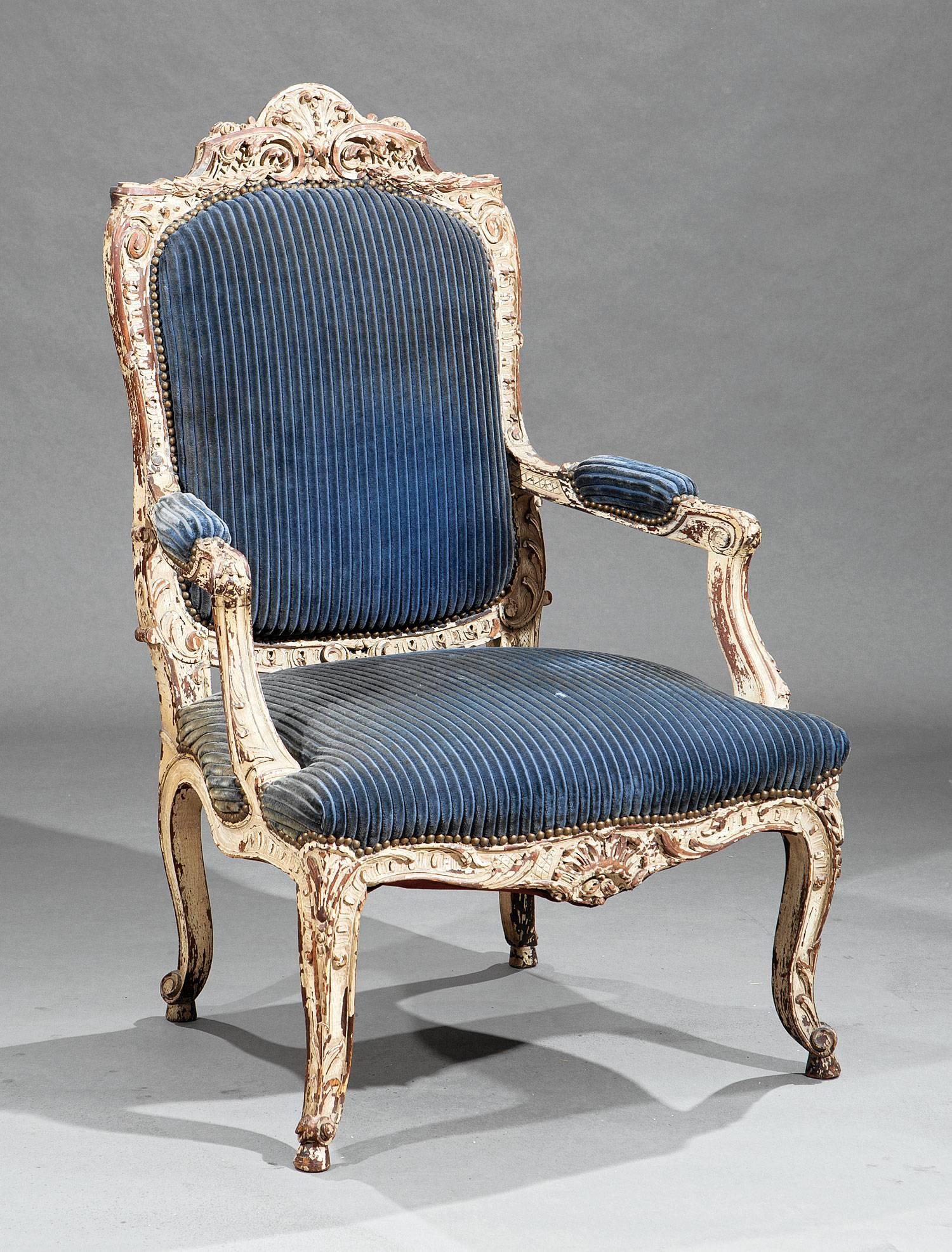 Tara Shaw Antiques - 19th century Regency style carved and painted Fauteuil à la Reine with upholstered back, arms and seat. Ornately carved with a foliate scroll crest, acanthus carved cabriole legs paired with charming scrolled toes. A gorgeous