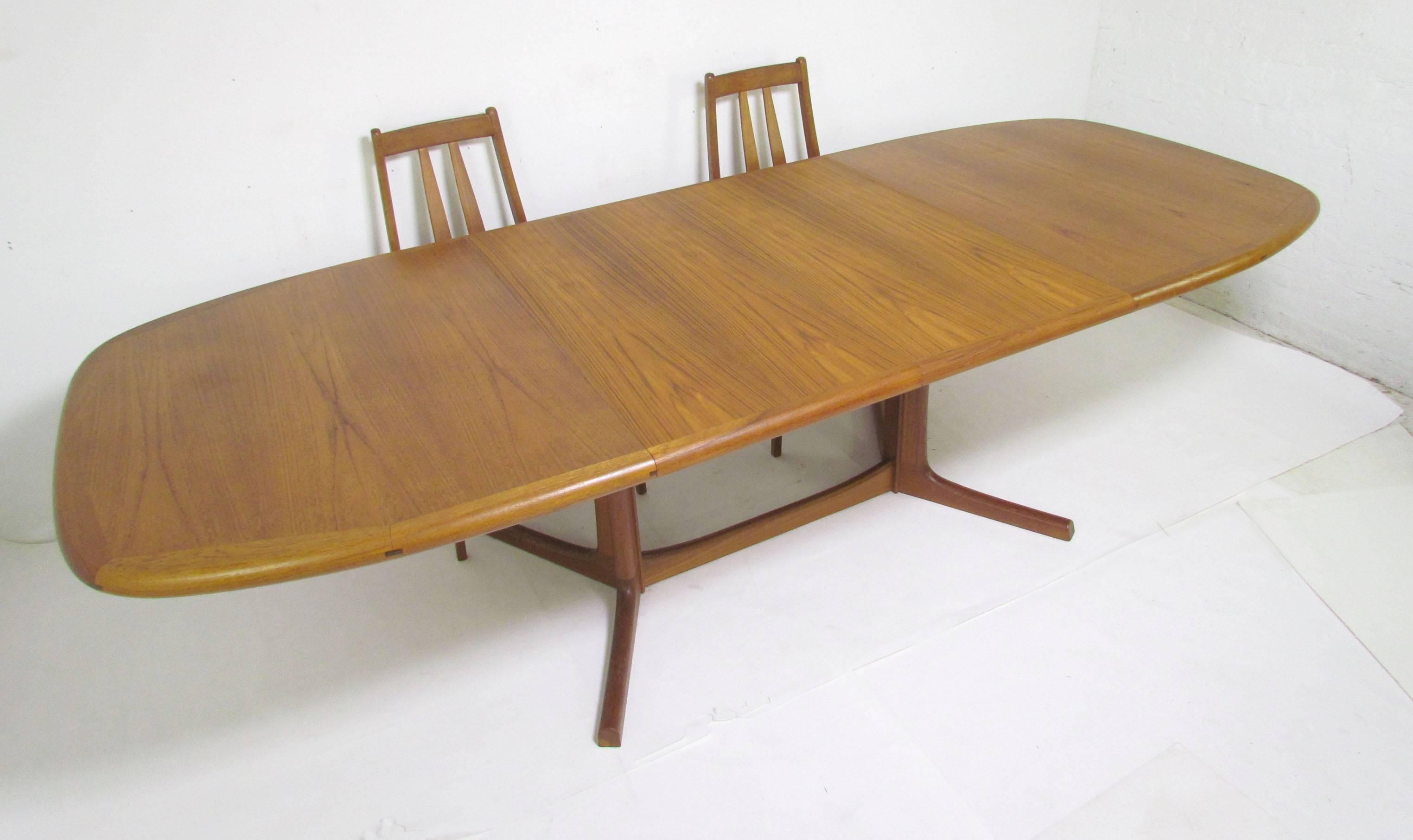 Danish Teak Dining Set, Expandable Oval Table and Six Chairs, circa 1970s In Good Condition In Peabody, MA