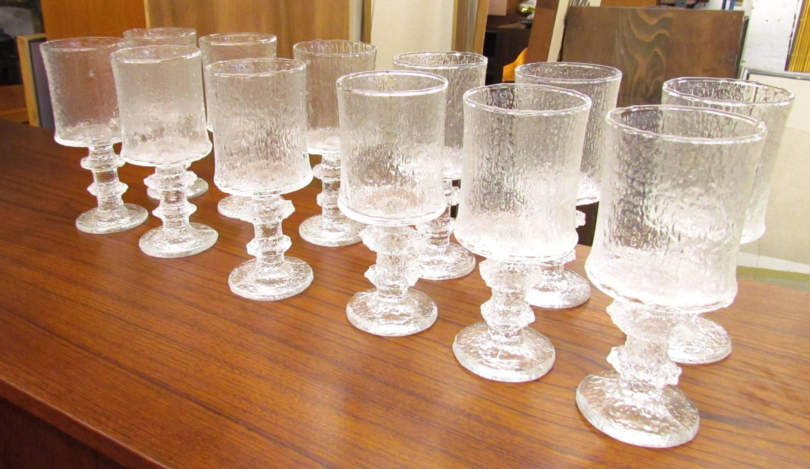 Set of twelve beer goblets in the Senator pattern designed by Timo Sarpaneva for Iittala, made in Finland, circa 1960s. Each one signed with initials 