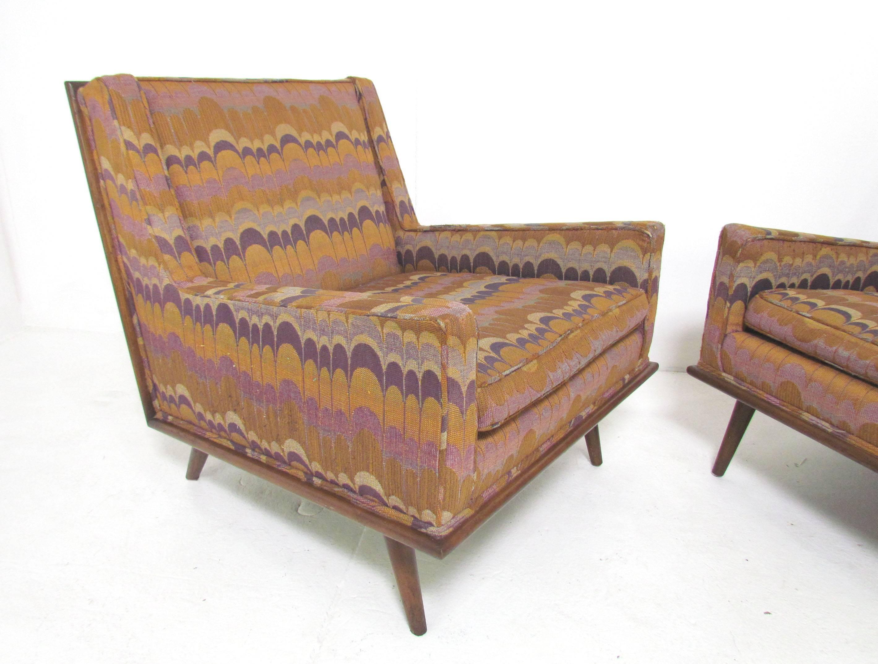 Pair of Mid-Century armchairs with walnut trim at base and back, in the manner of designs by Paul McCobb and Milo Baughman (for James).
