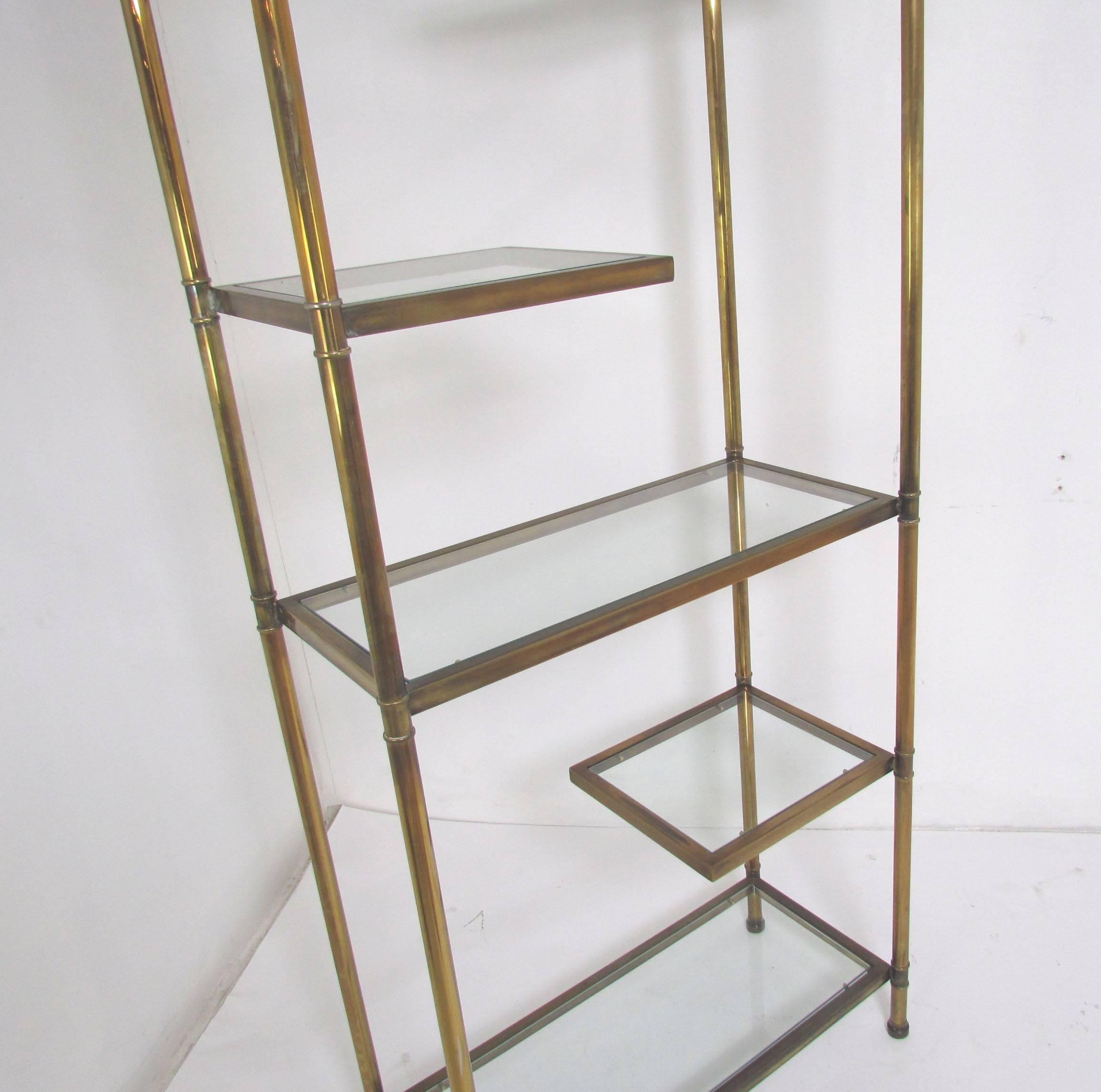 Unknown Hollywood Regency Étagère in Brass with Cantilevered Display Shelves