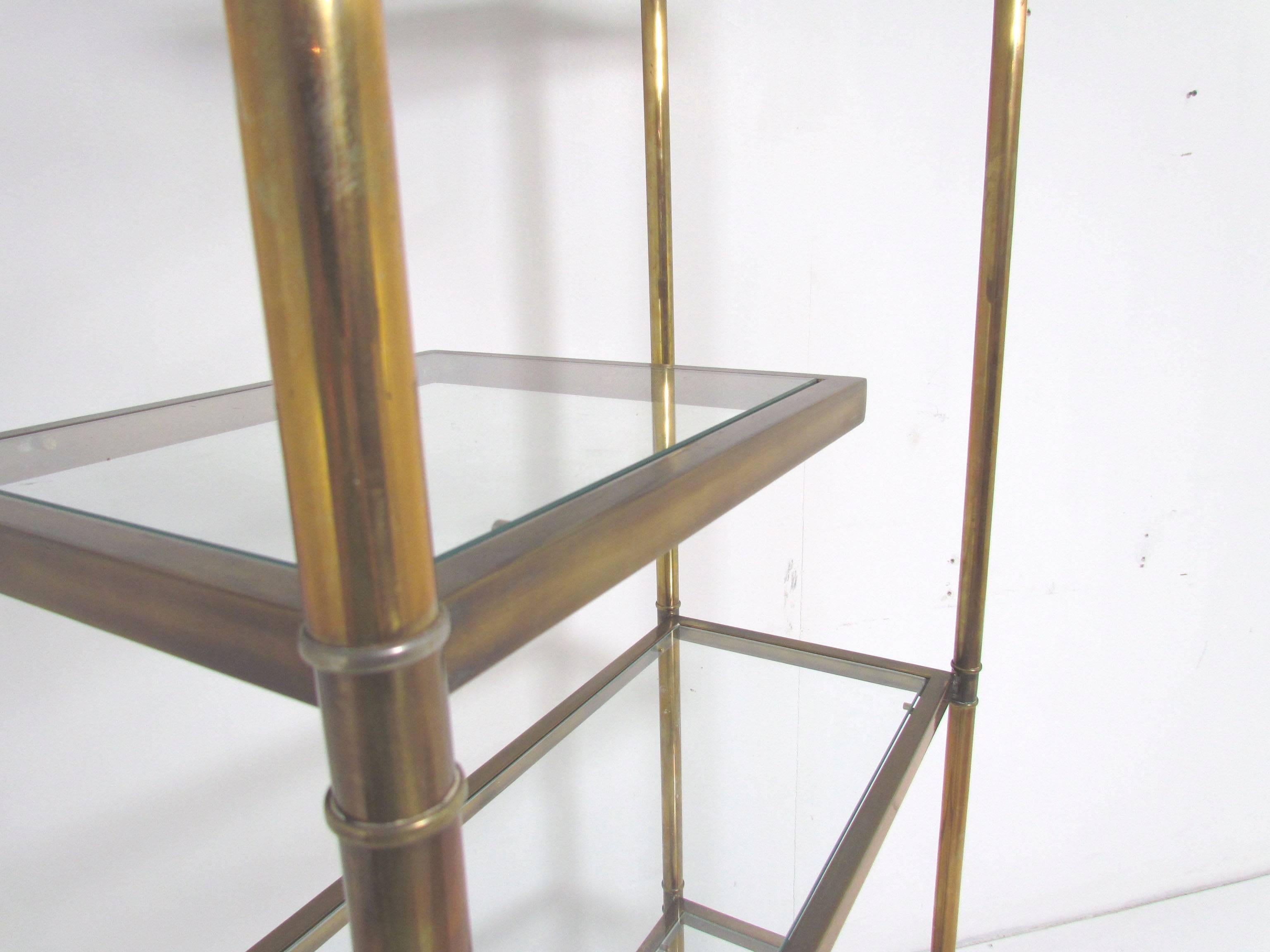Mid-20th Century Hollywood Regency Étagère in Brass with Cantilevered Display Shelves