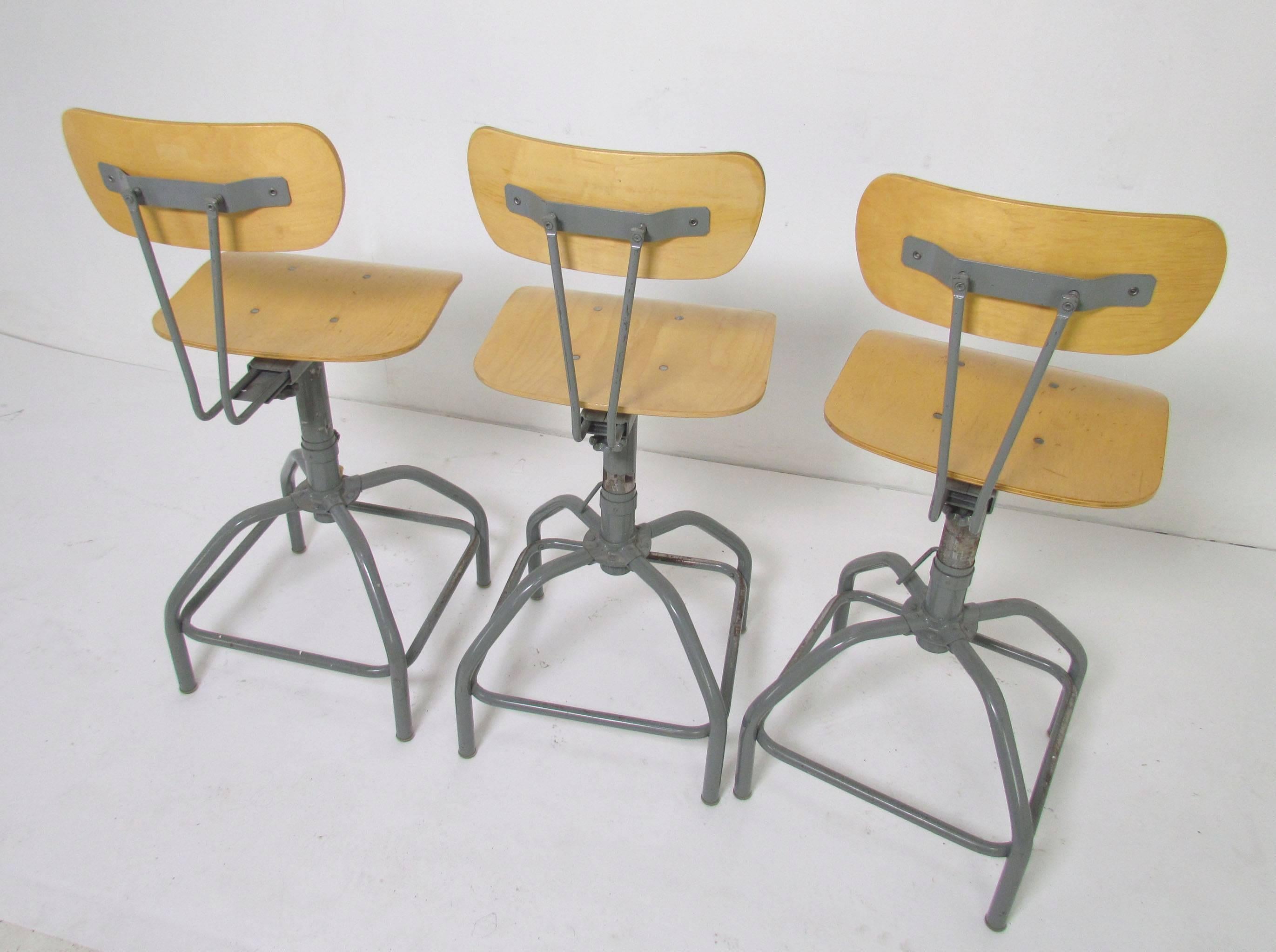 Metal Set of Three Industrial Adjustable Height Laboratory (Bar) Stools, circa 1970s