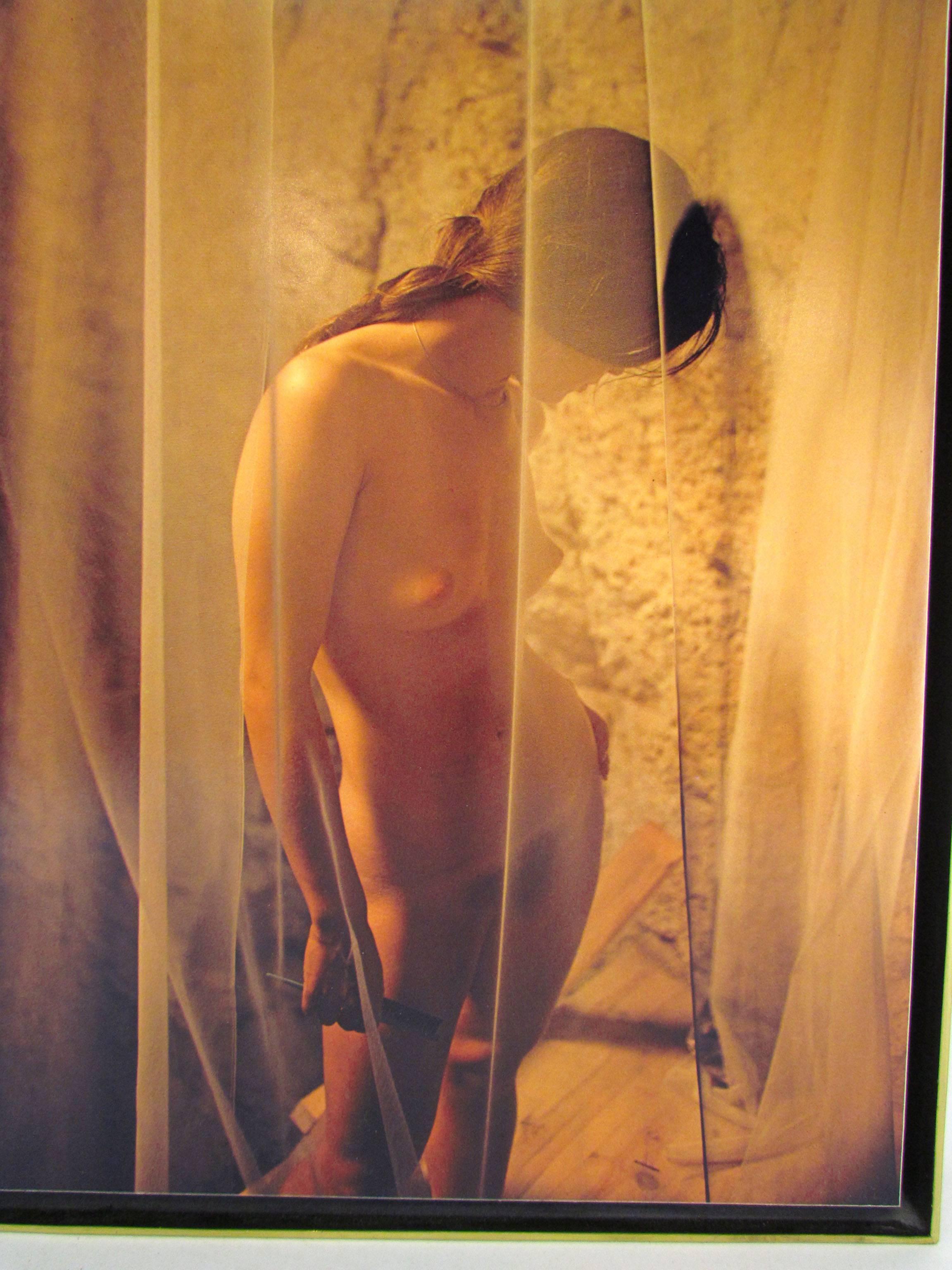 Color photograph of a nude behind gauzy curtains in natural light, circa 1970s, mounted in a bronze frame. Signed and numbered edition of 100 by listed New York photographer Jay Maisel.