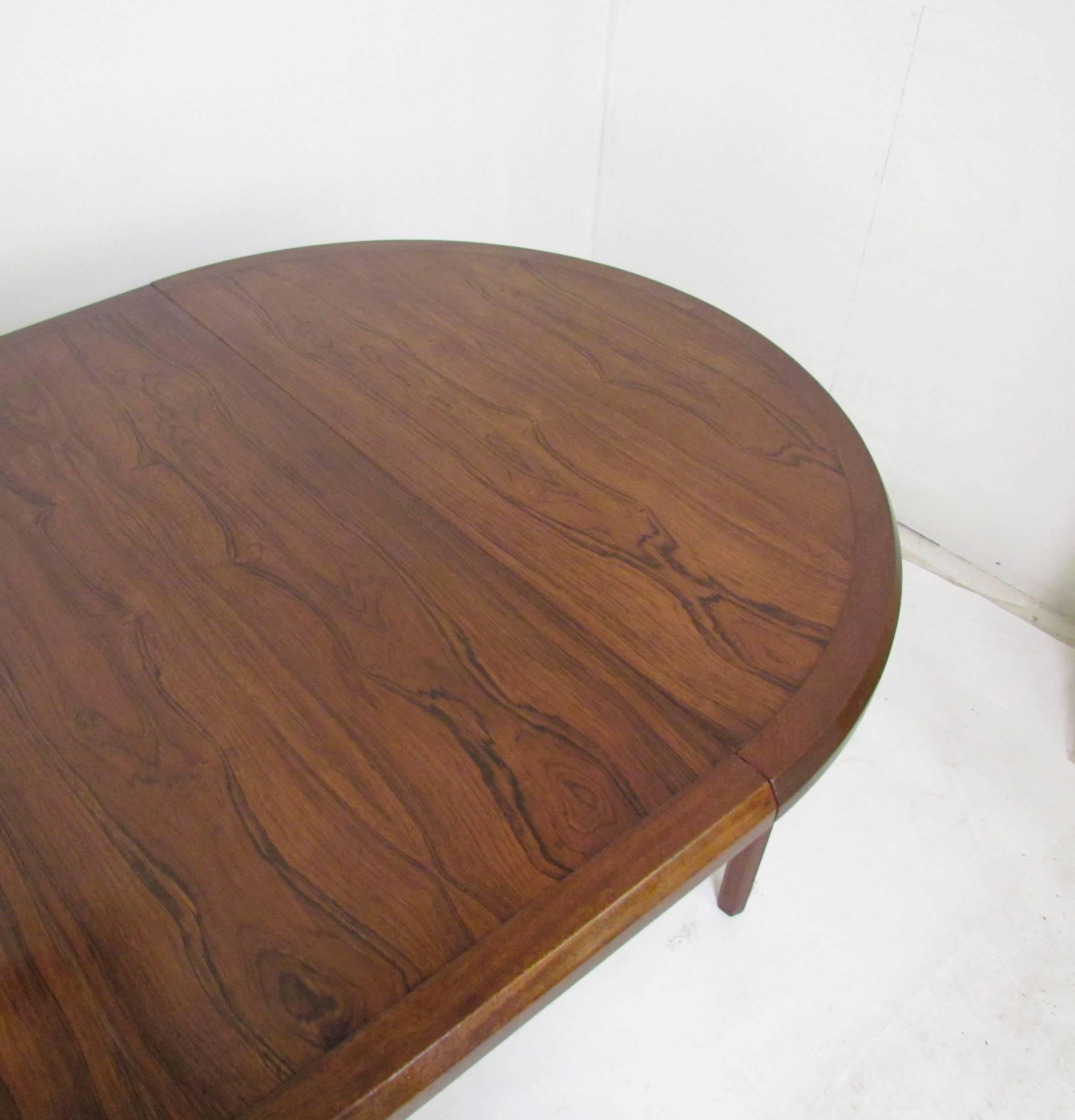 Mid-Century Circular Rosewood Dining Table with Three Leaves by John Stuart 1