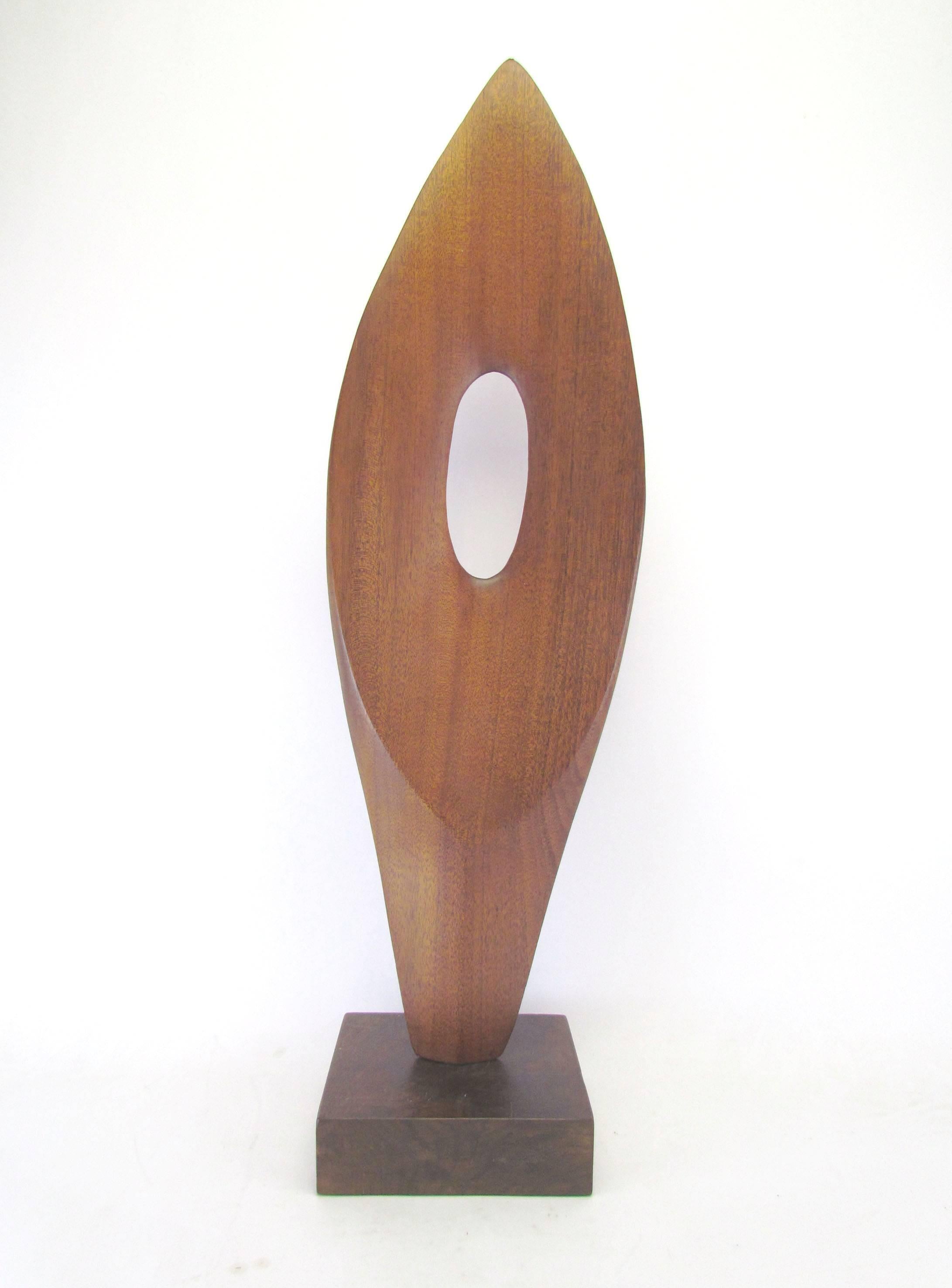 Sensuous modernist carved teak sculpture signed C.T. Armstrong and dated 1973.