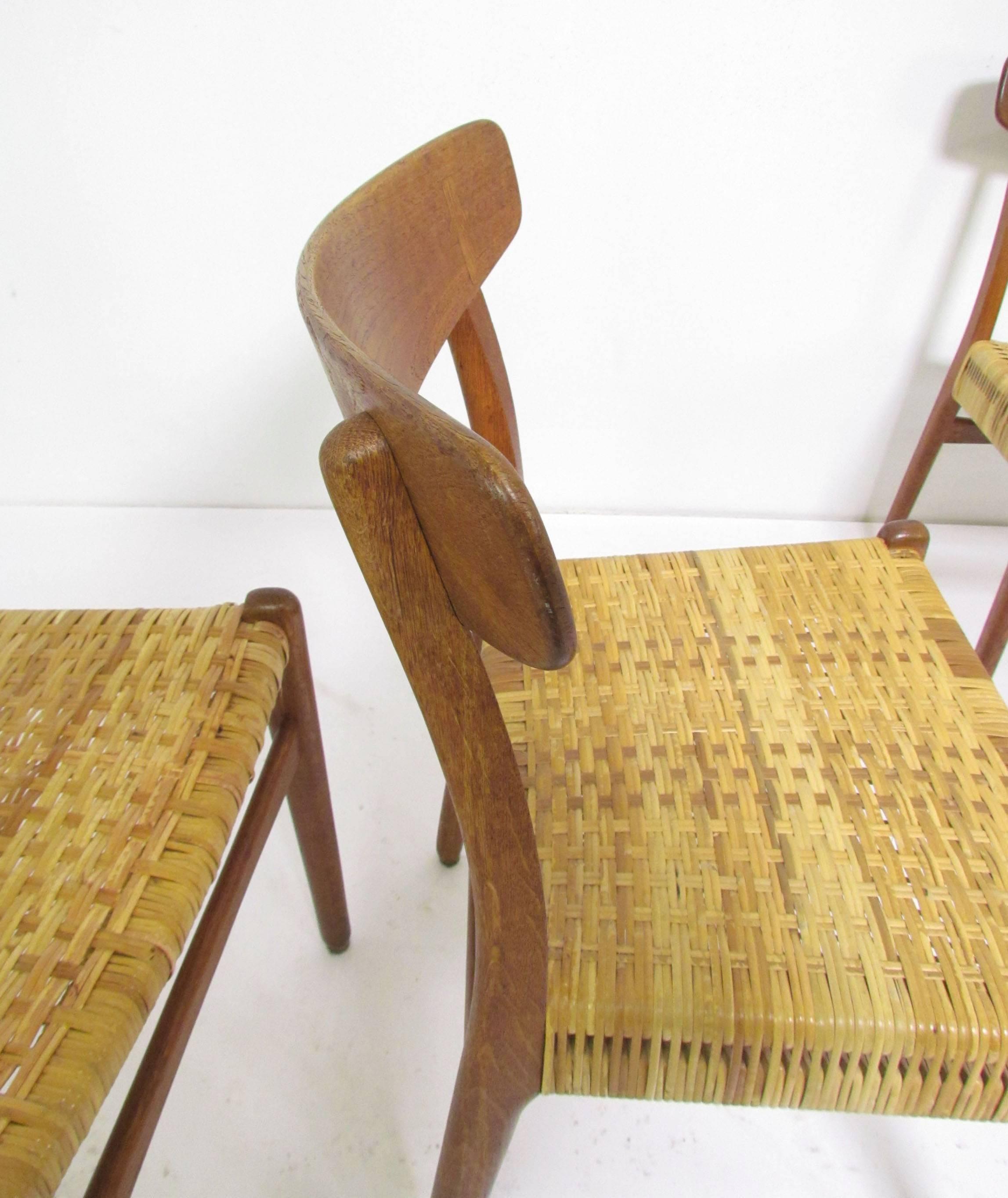 Set of Four Hans Wegner CH-23 Dining Chairs in Cane, Teak and Oak, circa 1950s 1