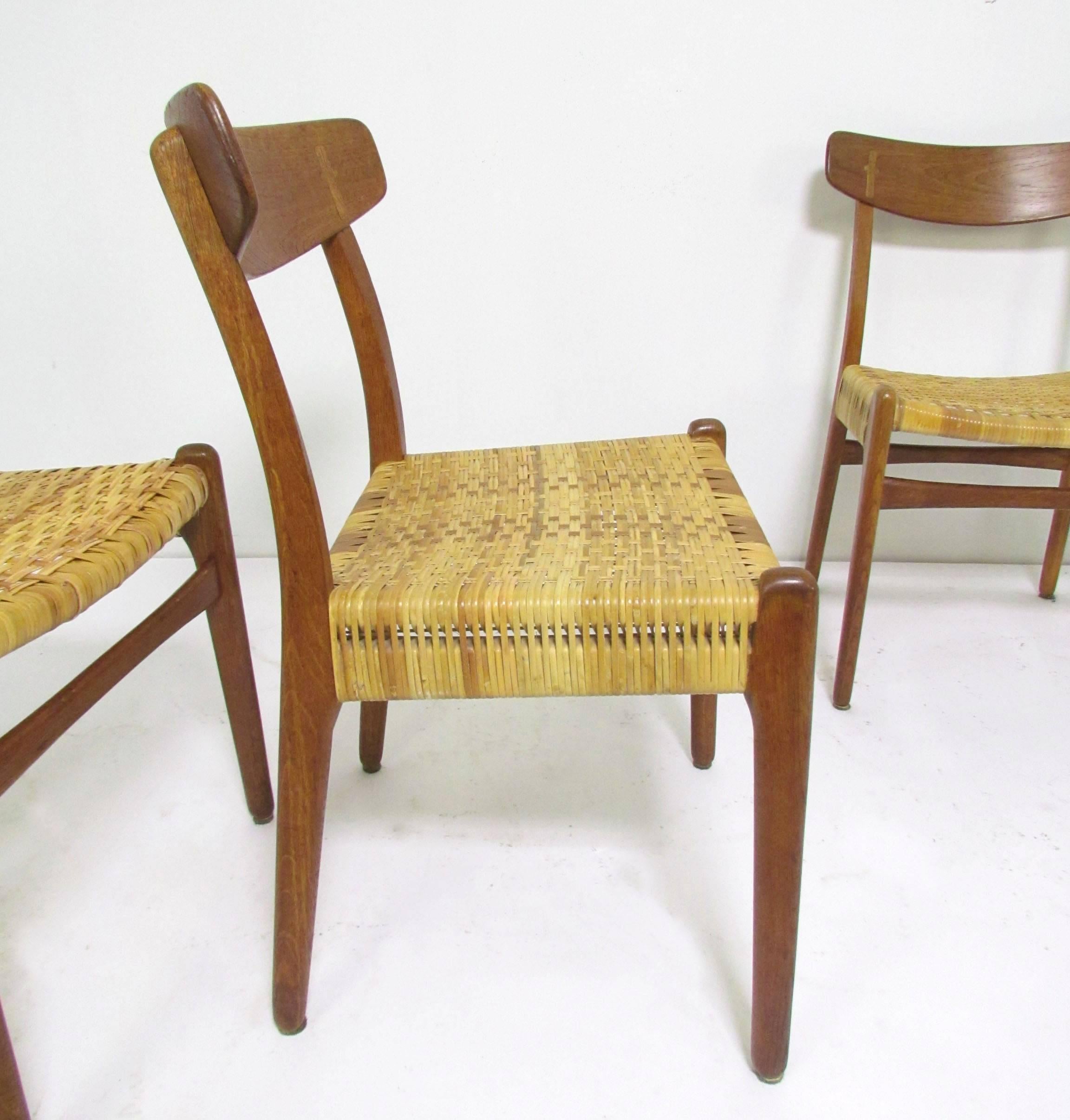 Mid-20th Century Set of Four Hans Wegner CH-23 Dining Chairs in Cane, Teak and Oak, circa 1950s