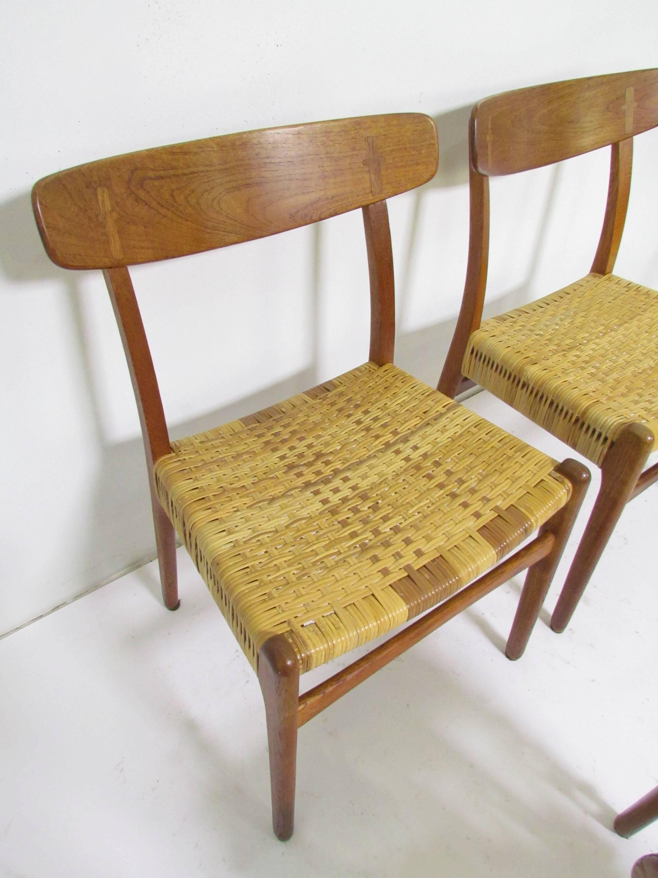 Danish Set of Four Hans Wegner CH-23 Dining Chairs in Cane, Teak and Oak, circa 1950s