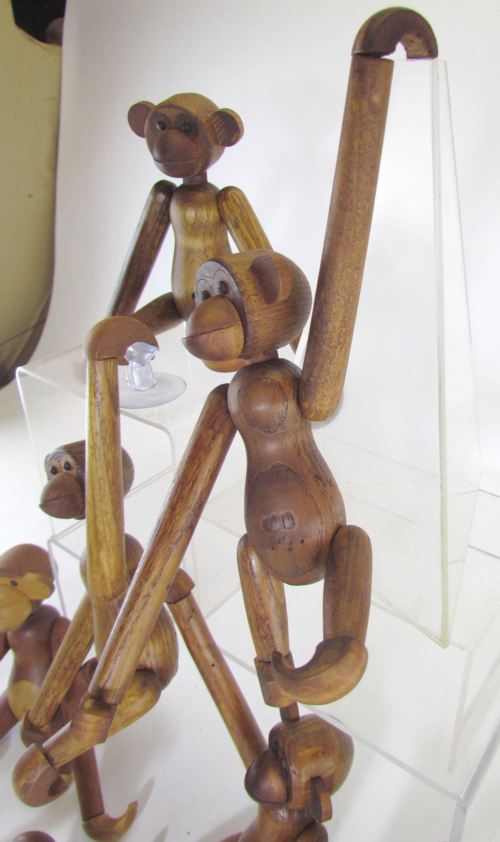 Mid-Century Modern Grouping of Teak Monkey Toys 1