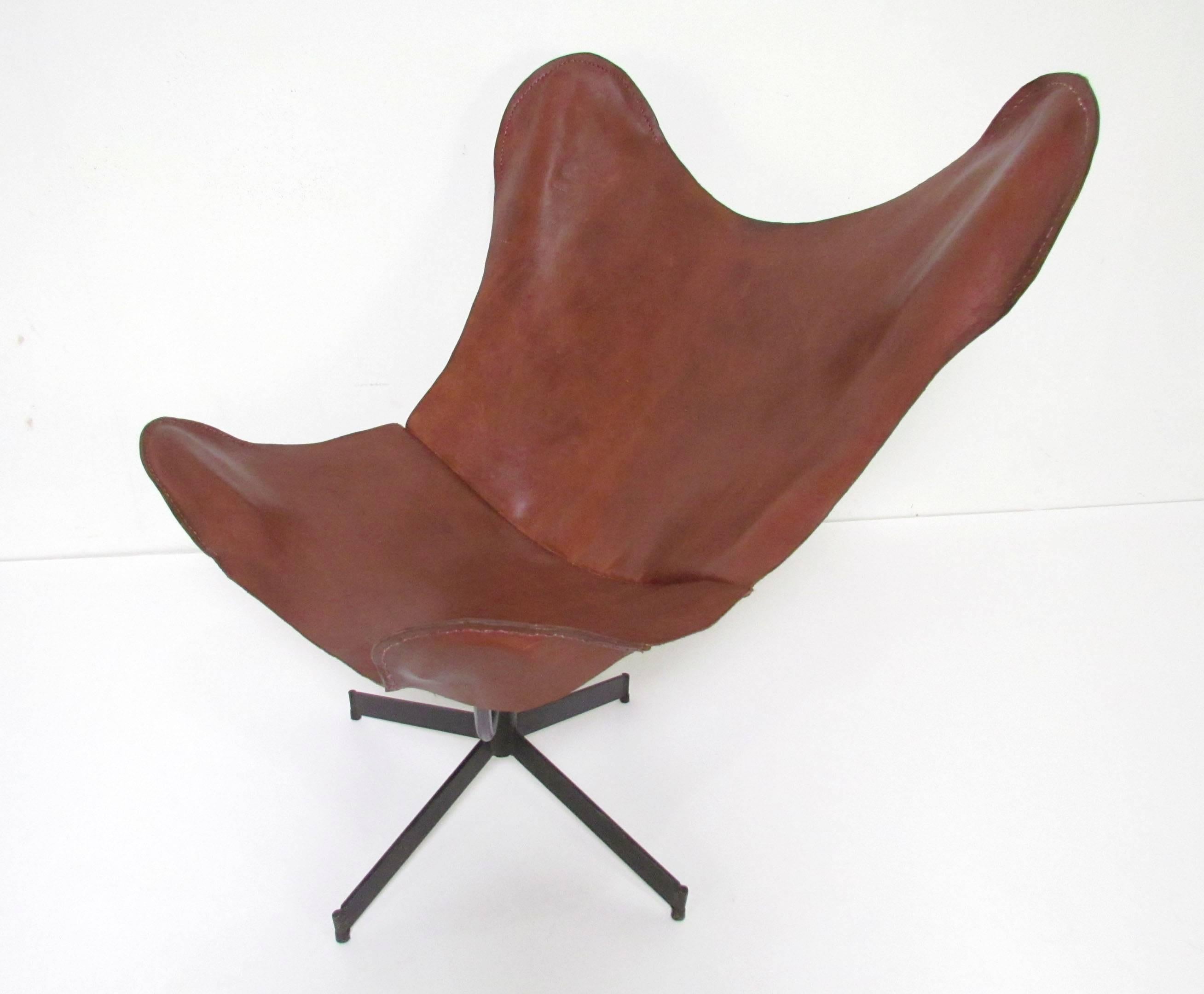Swivel lounge chair with leather sling for Leathercrafter New York, attributed to William Katavolos.