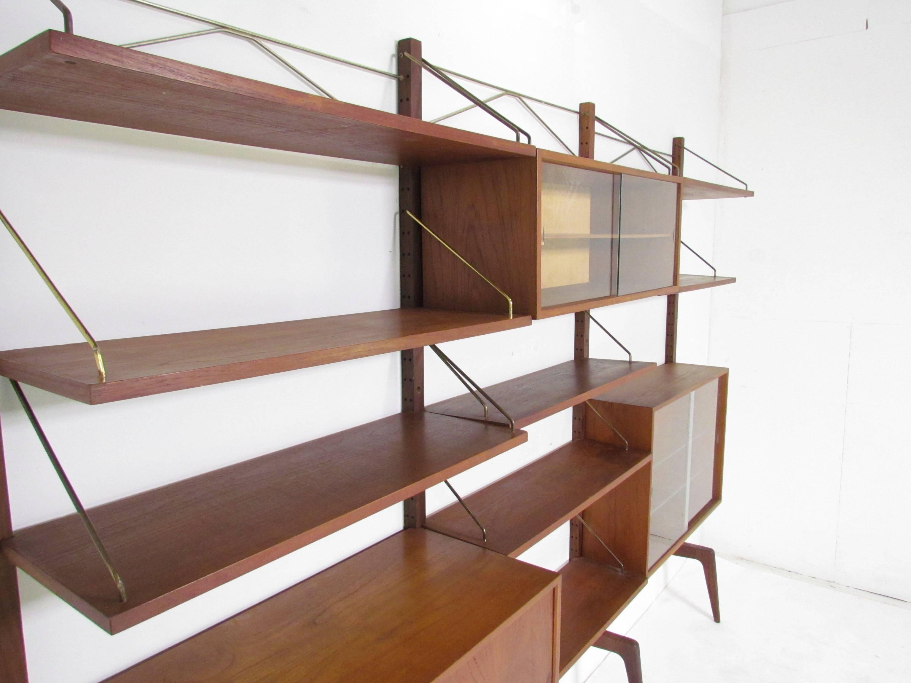 Danish Teak Wall-Mounted Shelving Unit by Poul Cadovius 'Cado', circa 1960s In Good Condition In Peabody, MA