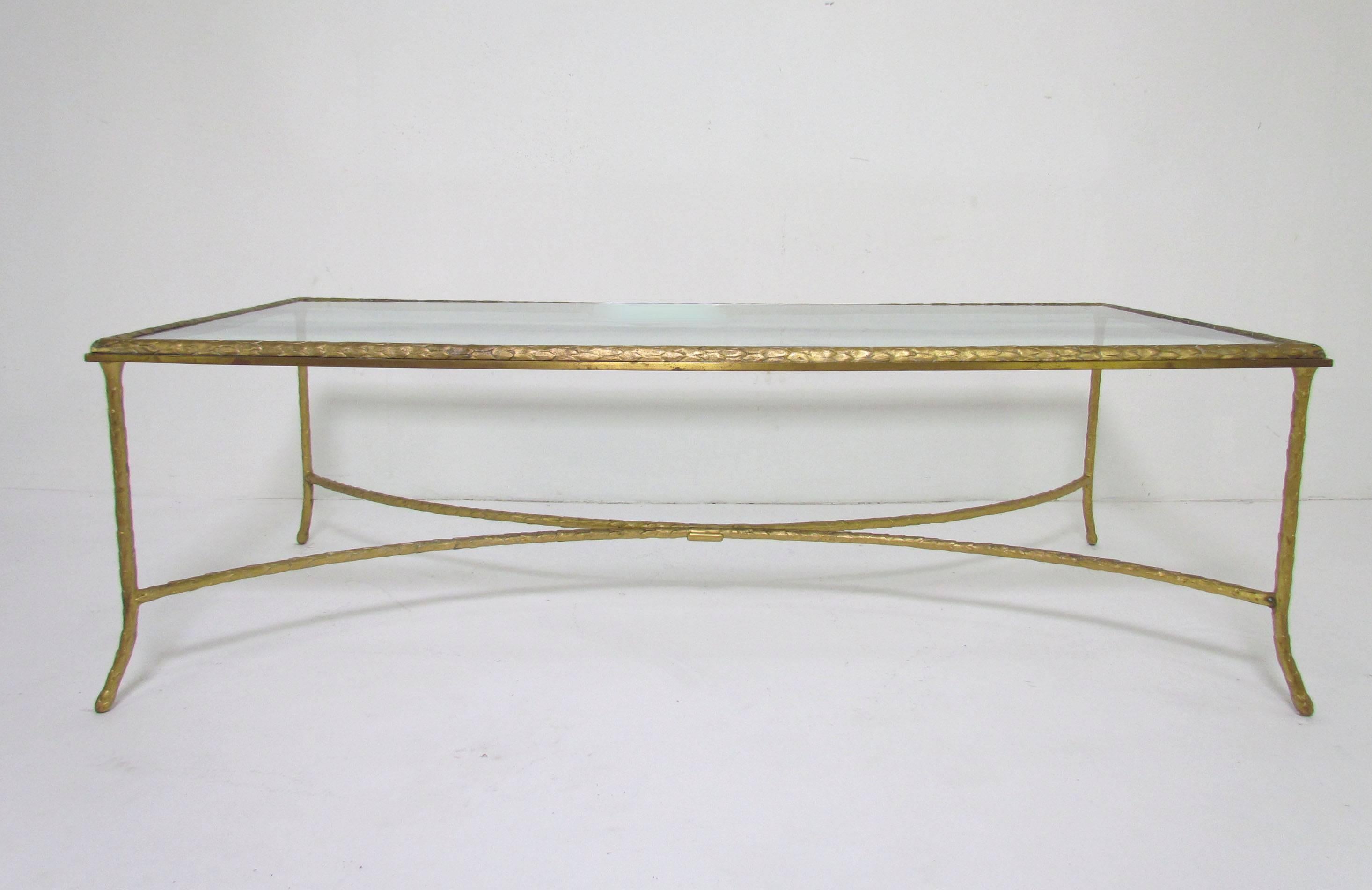 Gilded bronze coffee table with chiseled palm leaf pattern, attributed to Maison Bagues, circa 1950s.