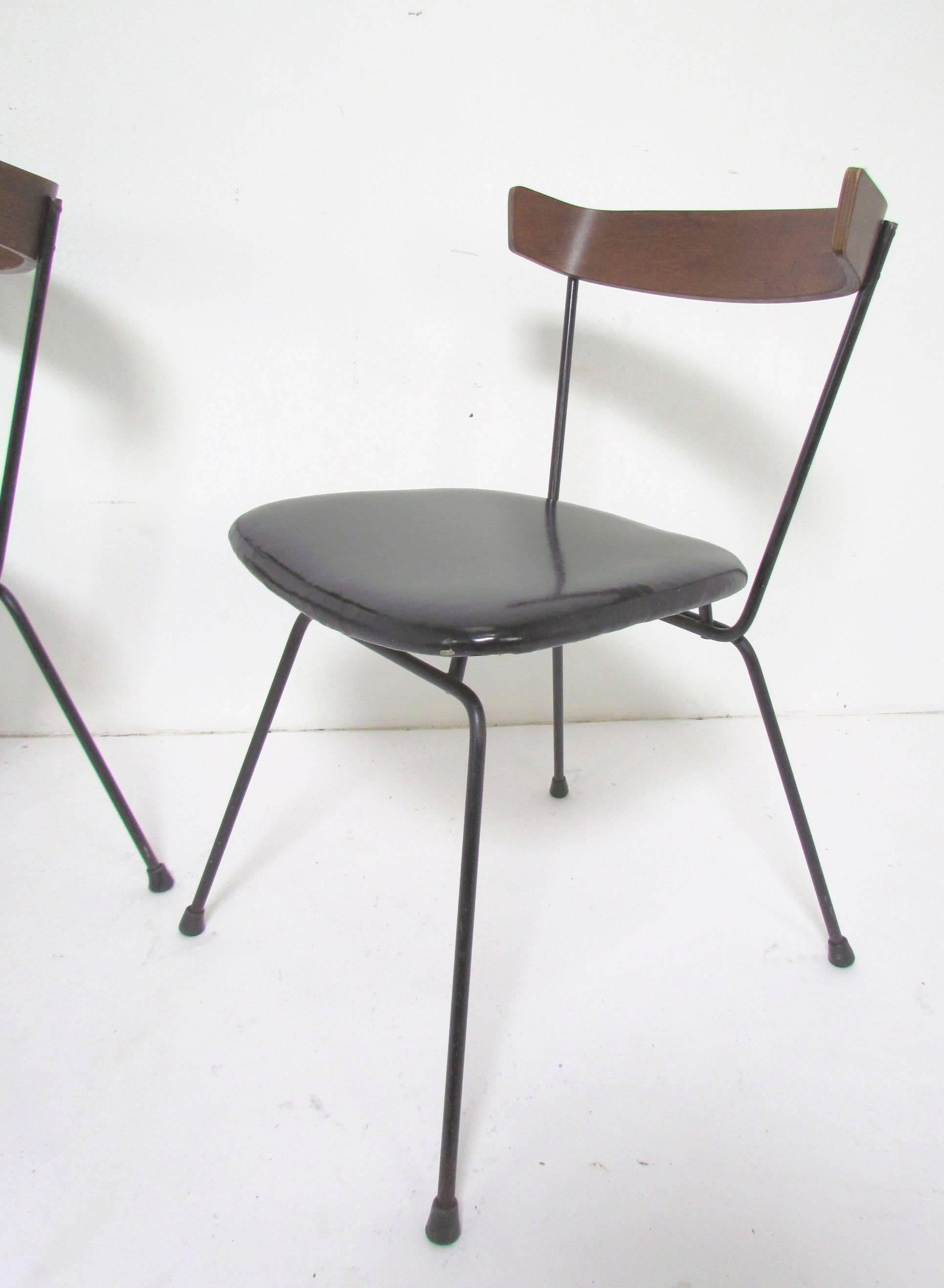 Set of four dining chairs by Clifford Pascoe for Modern Masters, Inc. A Classic example of 1950s wrought iron 