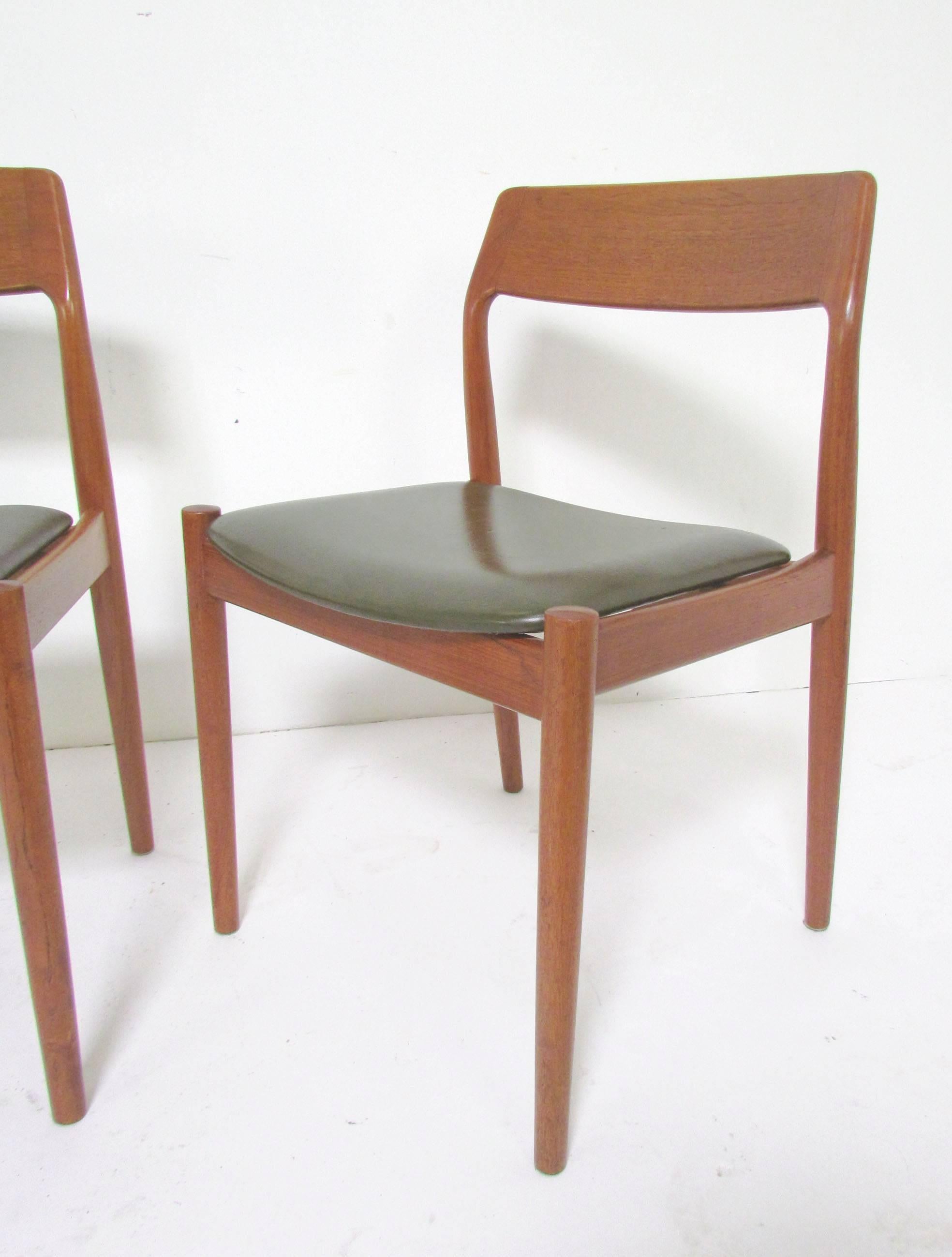 Set of six teak dining chairs with carved backs, in the manner of Niels Moller, by Scantic Mobelvaerk made in Denmark, circa 1960s.