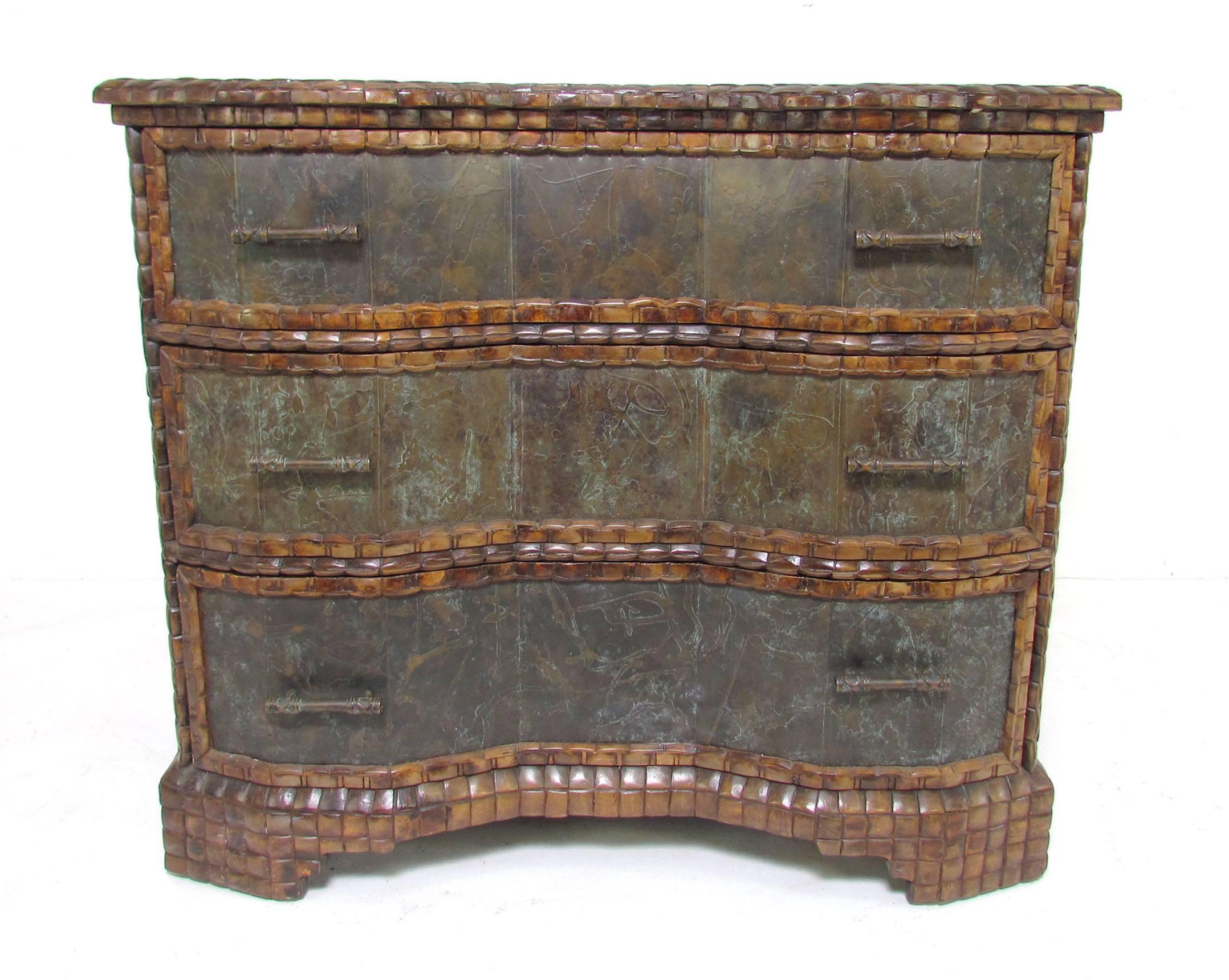 Unusual commode chest by Maitland-Smith. Patinated etched bronze drawers with bronze handles and a coconut shell encrusted case.