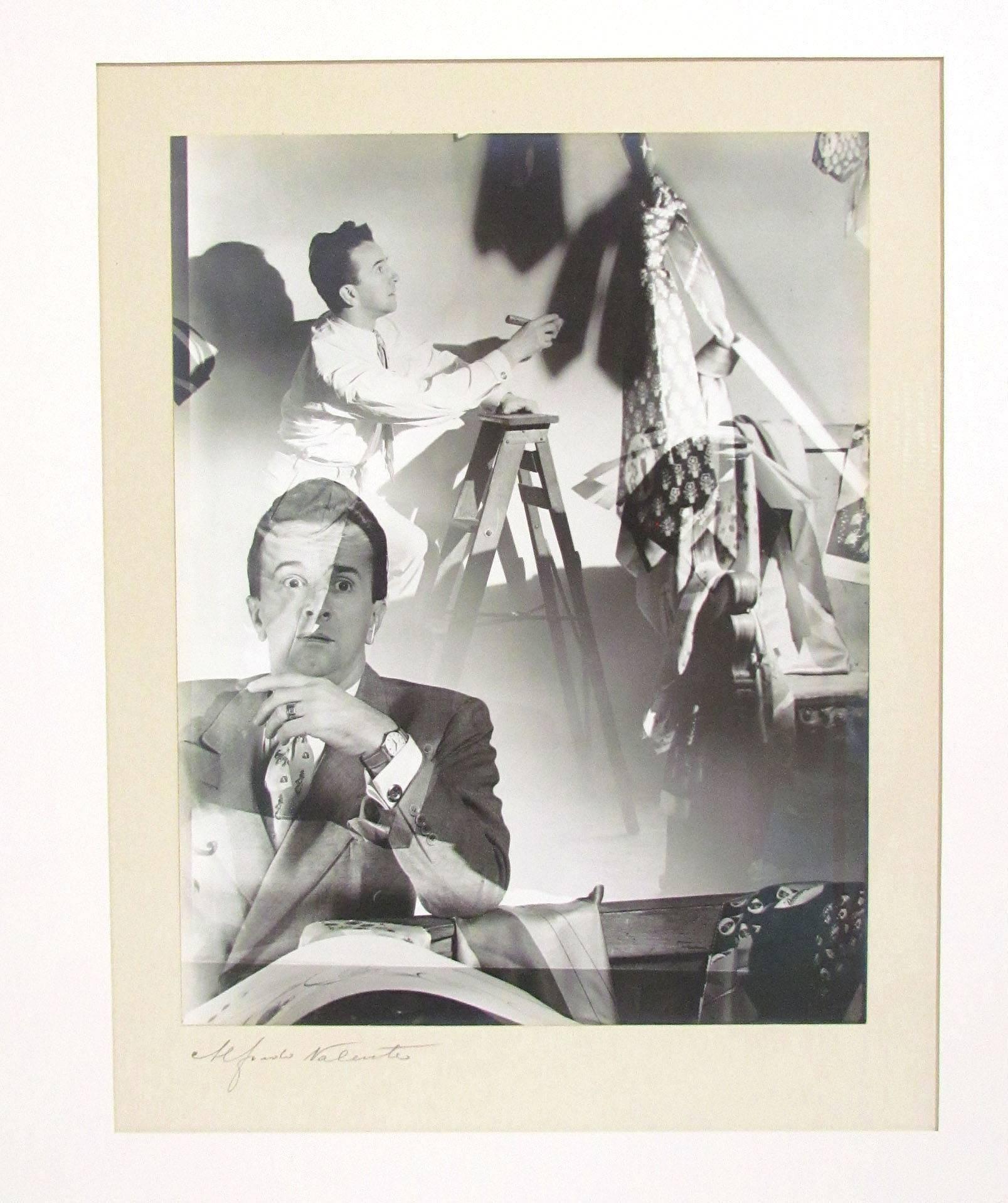 Pair of original silver gelatin photography prints circa 1950s by noted New York photographer Alfredo Valente, both professionally framed and matted, and signed in pencil. Both portraits depict a stylish man who appears to be a designer of ties and