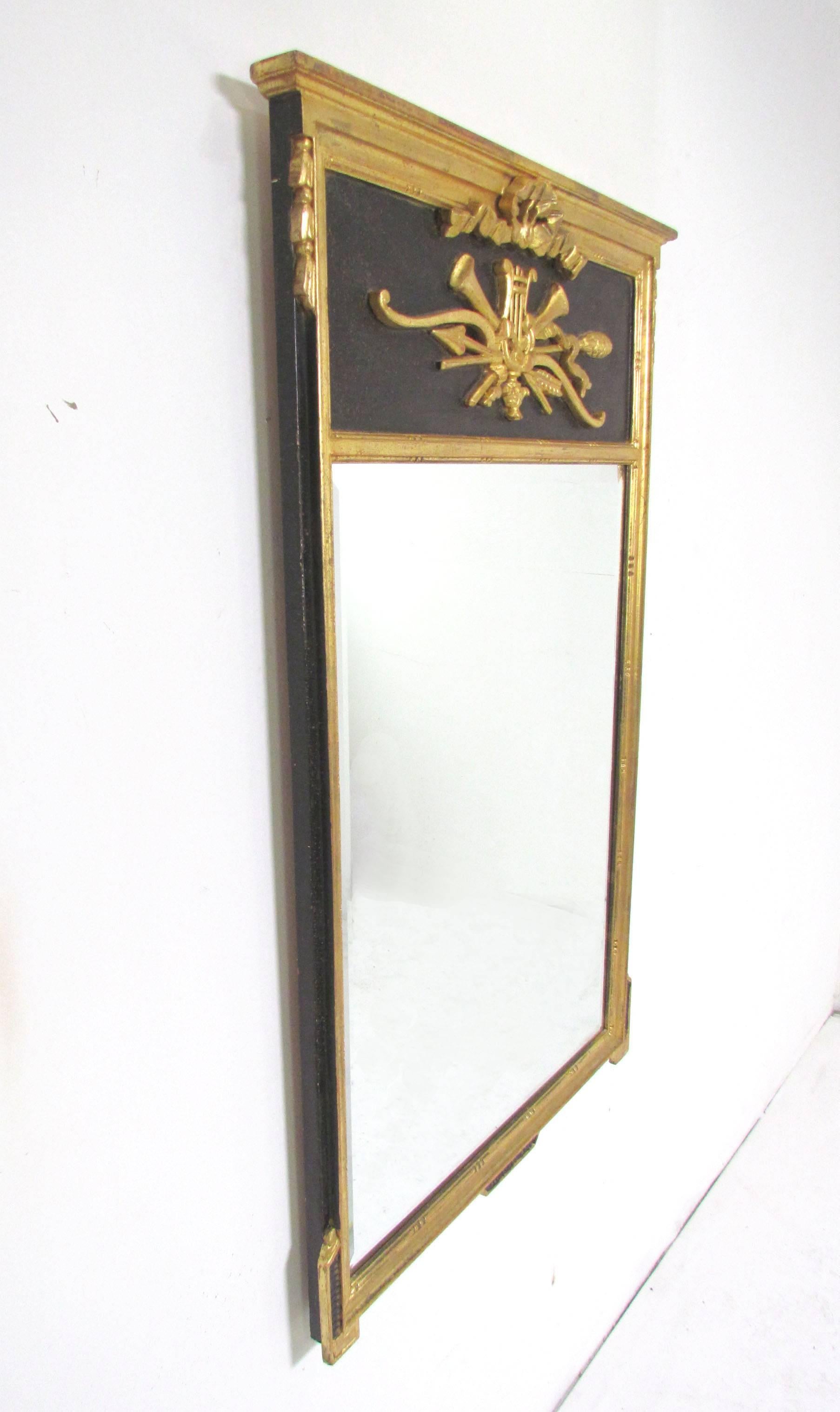 Elegant neoclassical style giltwood wall or mantel mirror with beveled glass, marked 