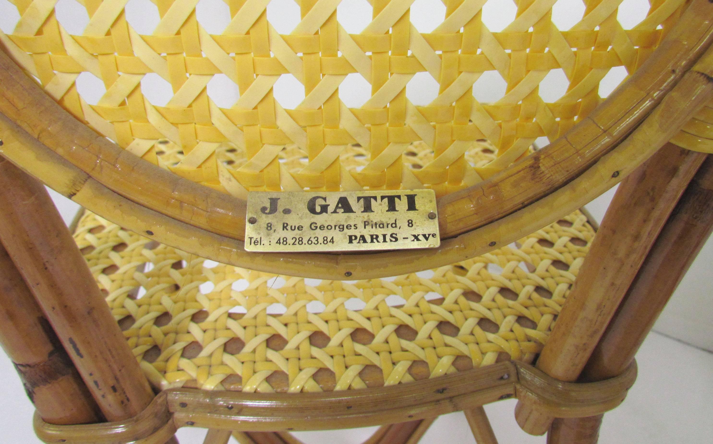 Set of four Classic bistro chairs in bamboo and cane, handmade in Paris, France by renowned maker J. Gatti (Maison J. Gatti). These are the model 