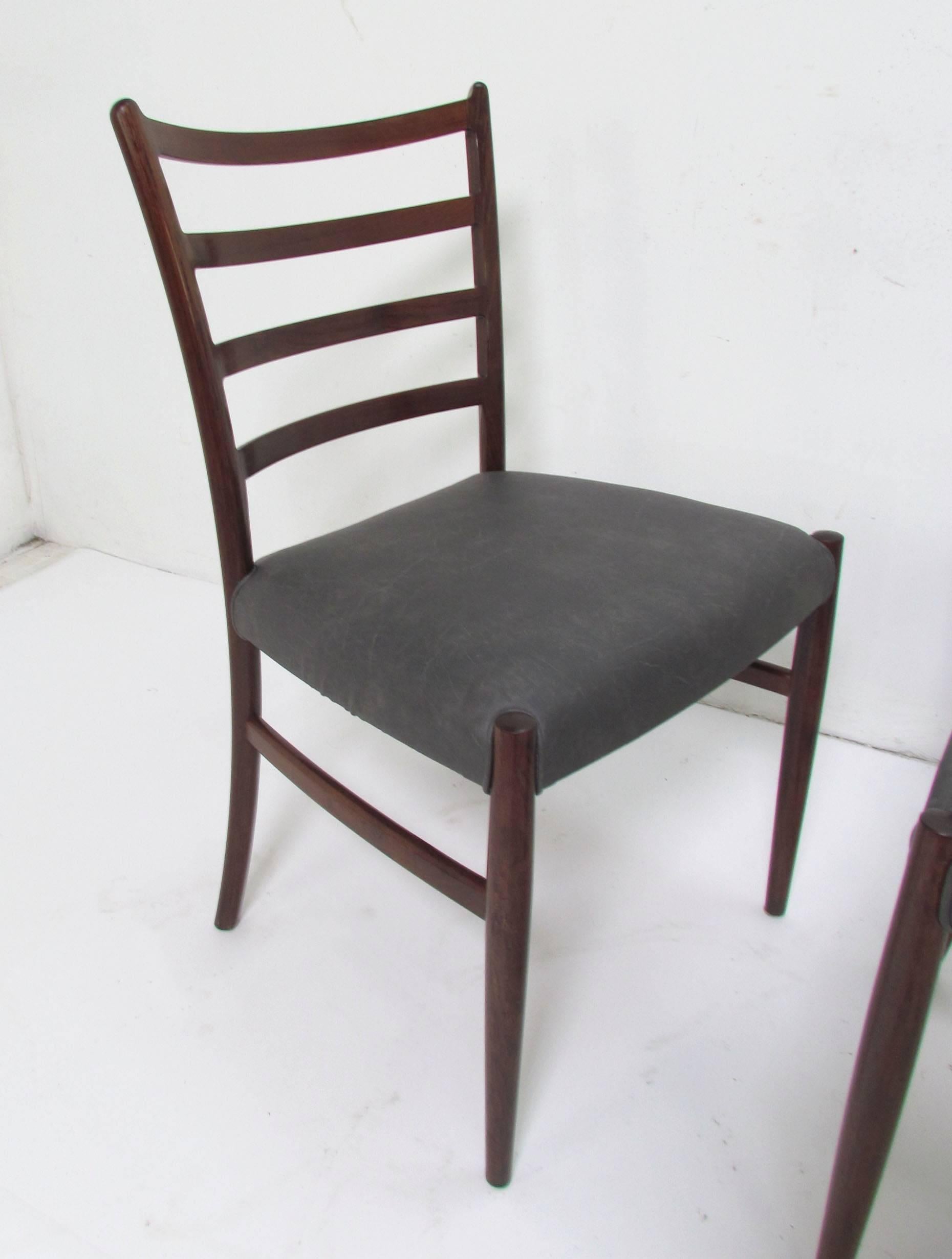 Set of six Danish rosewood ladder-back dining chairs, circa 1960s. These are often attributed to Johannes Andersen, for SVA Mobler.